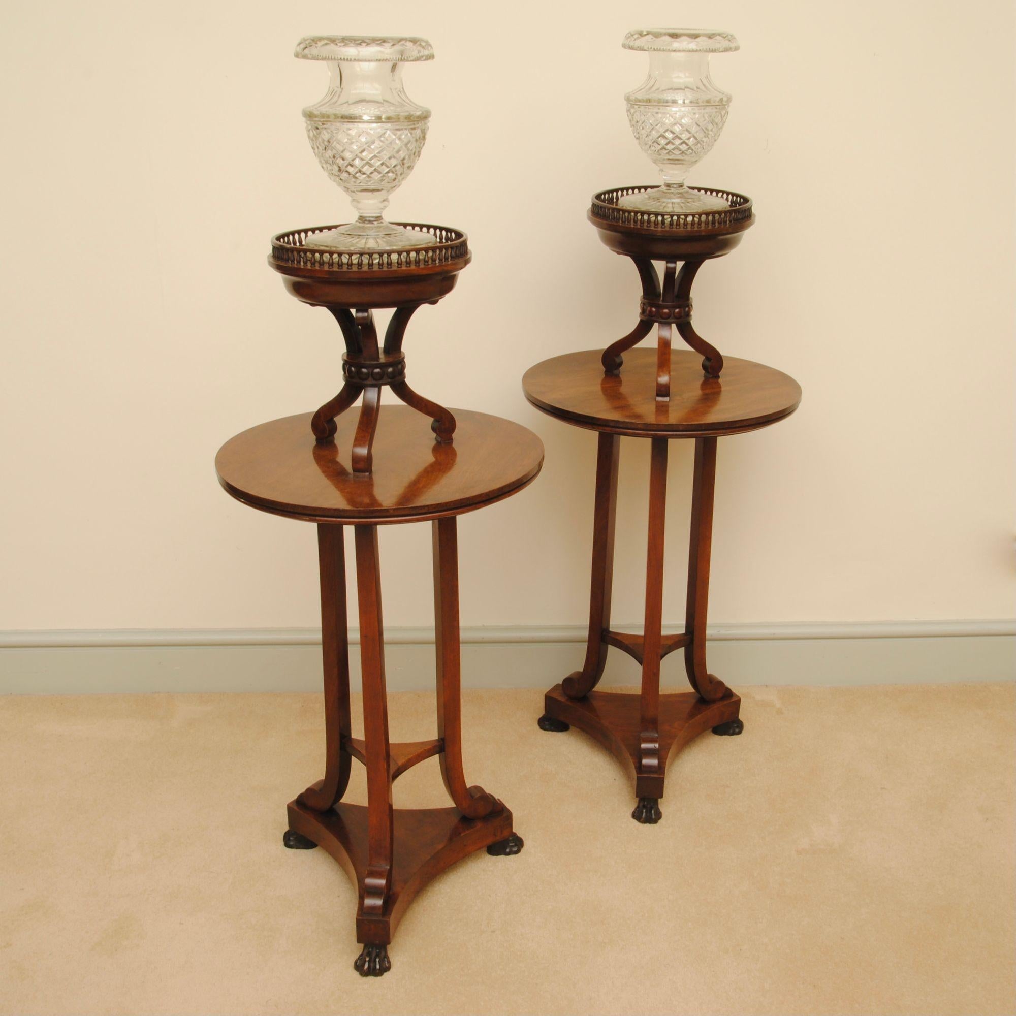 A very smart pair of Regency period mahogany stands or tourchers with the cut glass vases included in the price. These lovely stands sat in the home of a retired antique dealer for as long as I can remember always with fresh flowers in the vases.