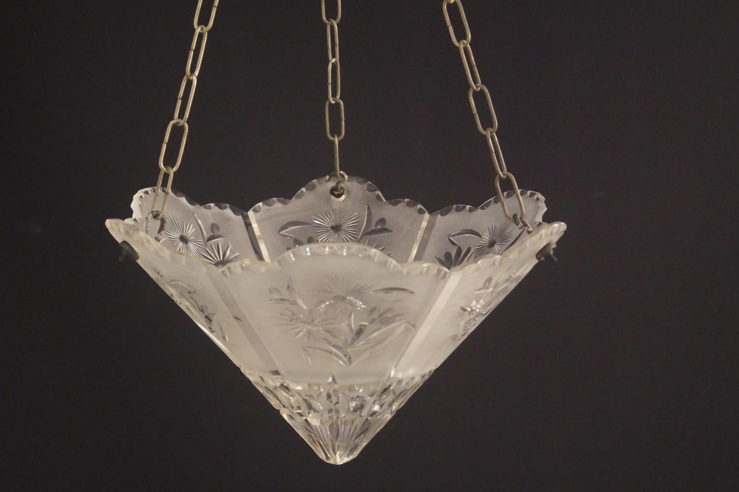 An unusual, Art Deco frosted cut glass ceiling light. English, circa 1920.
Professionally wired for electricity.
  