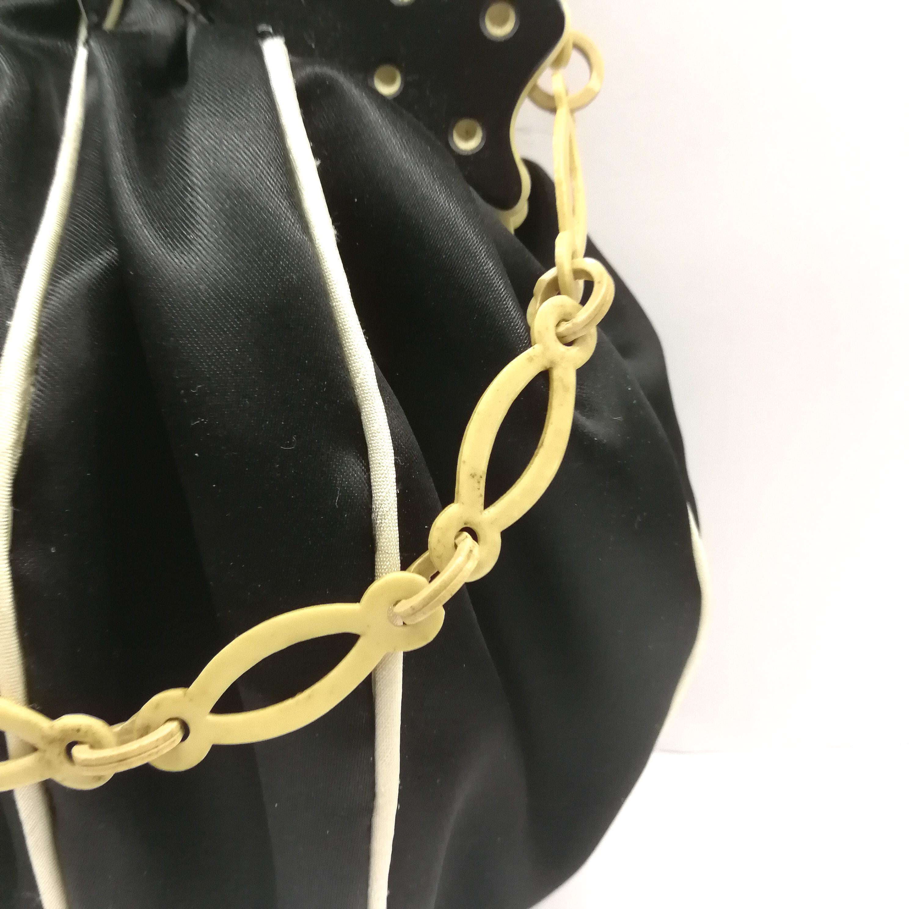 Black An unusual Bakelite frame and silk  'butterfly' handbag, English, 1920s. For Sale