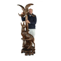 An unusual ‘Black Forest’ walnut eagle and chamois hall stand