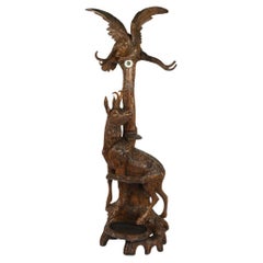 An unusual ‘Black Forest’ walnut eagle and chamois hall stand