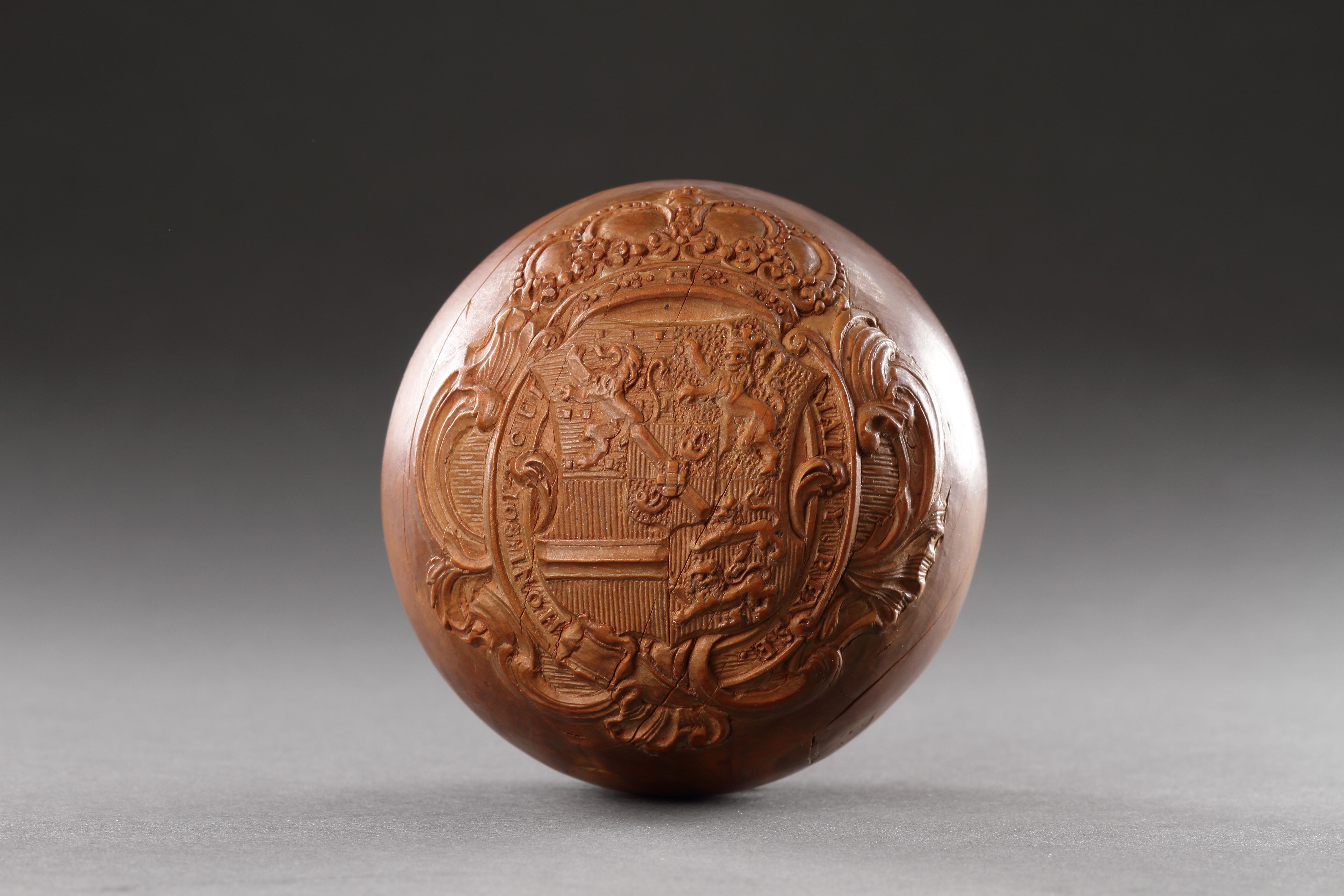 An Unusual Carved Boxwood ‘Sphere’
The circumference carved in low relief with the provinces of the Netherlands to one side and the National Arms to the opposite side
Boxwood
The Netherlands
Late 17th or Early 18th Century

SIZE: 8cm dia. - 3³⁄₈ ins