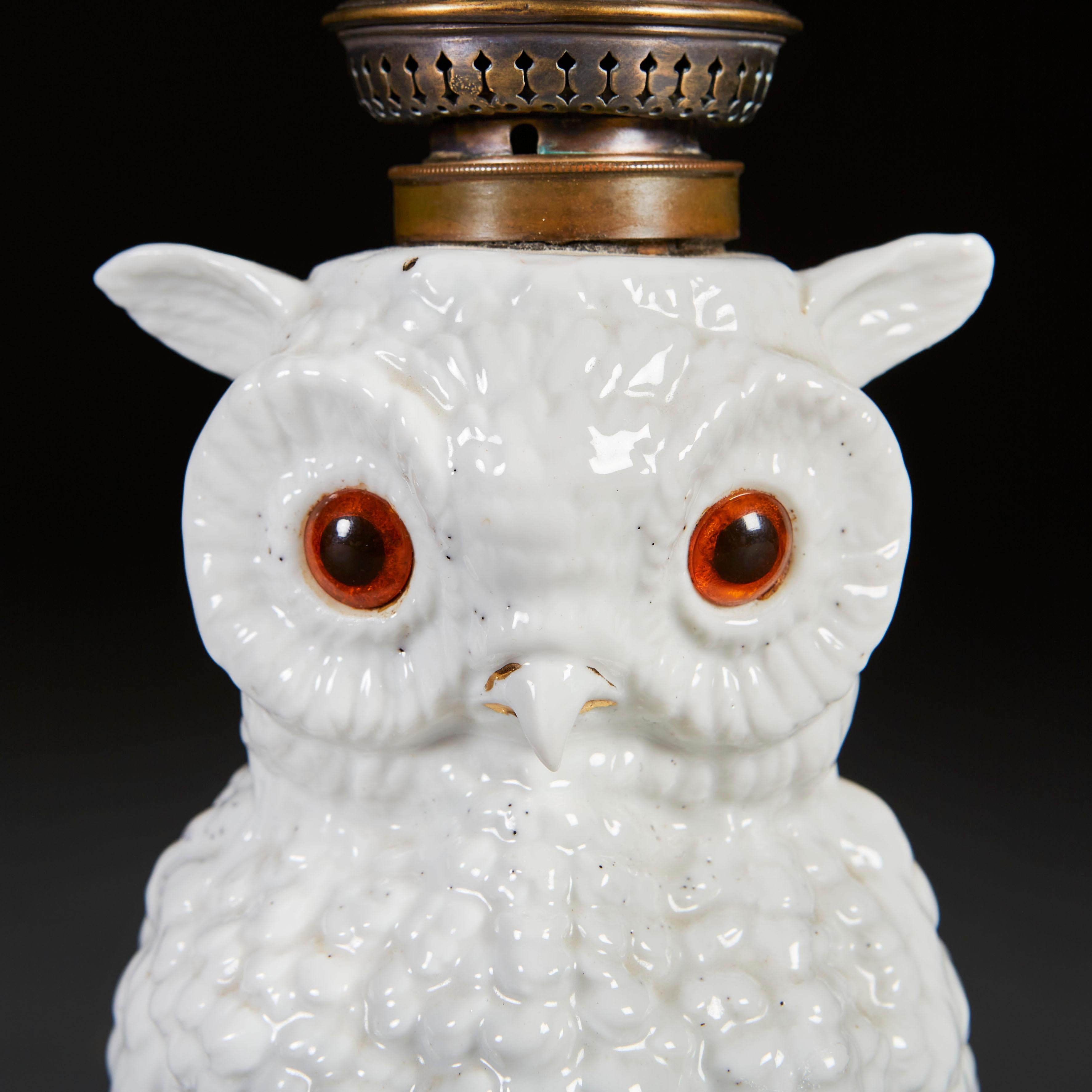 white ceramic owl lamp