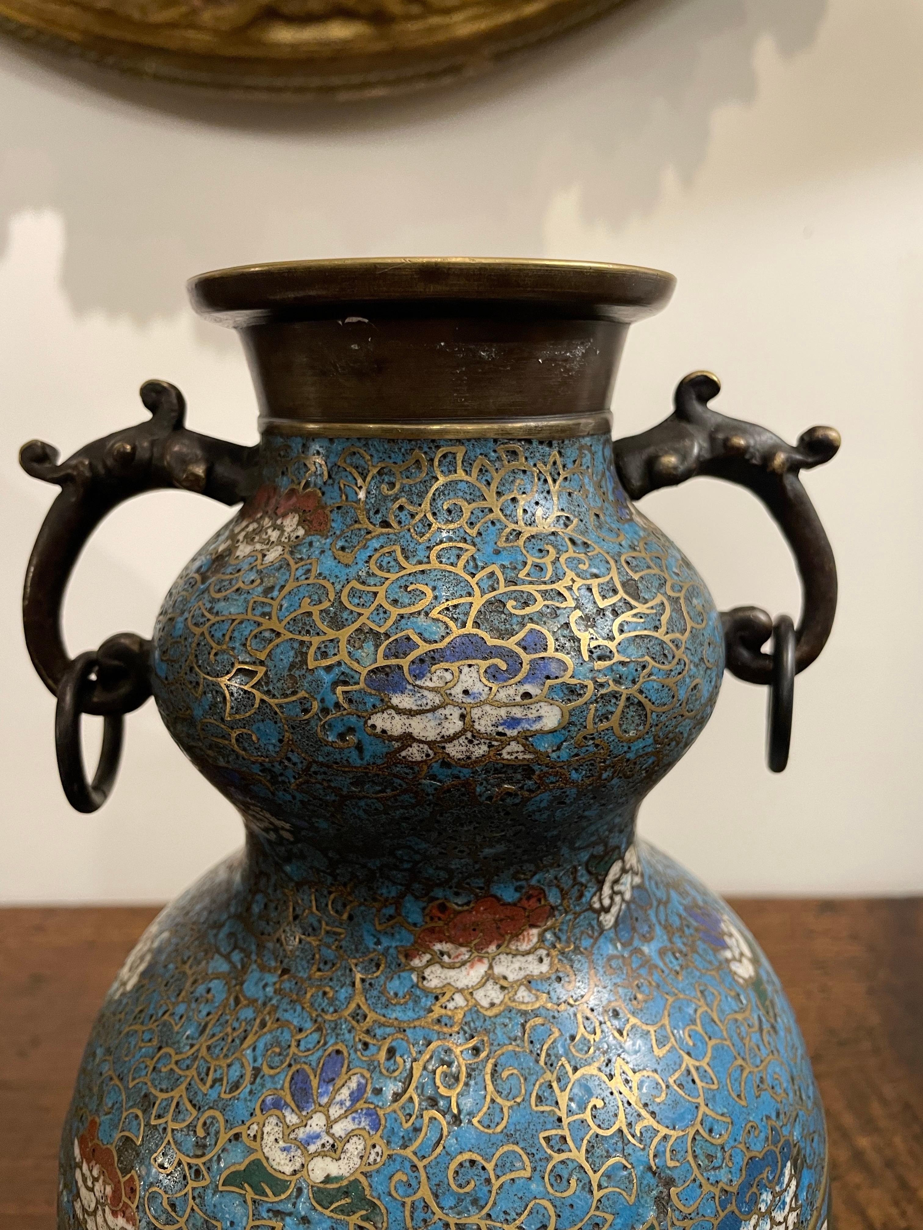 An Unusual Chinese Cloisonne Vase with Elephant Shaped Handles, 19th Century
Home decor, Interior design and collectibles.

Provenance: Private Perth Collection.

Dimension:
Height: 36.5cm
Diameter: 15cm.