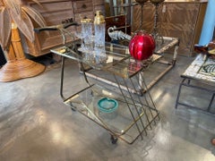 An unusual designed Italian 1950s brass bar trolley by Cesare Lacca