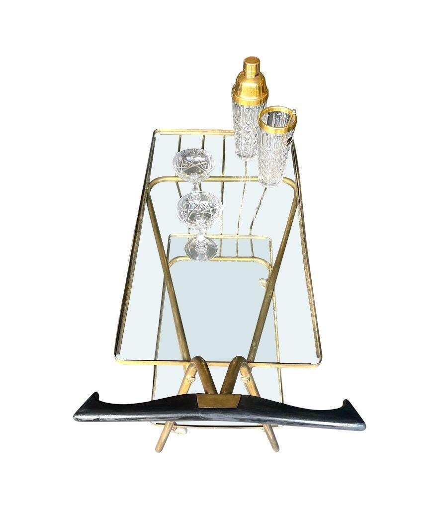 Brass An unusual designed Italian 1950s brass bar trolley by Cesare Lacca For Sale