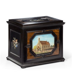 An unusual ebony bijouterie table cabinet showing Calvary Church, Stonington, Lo
