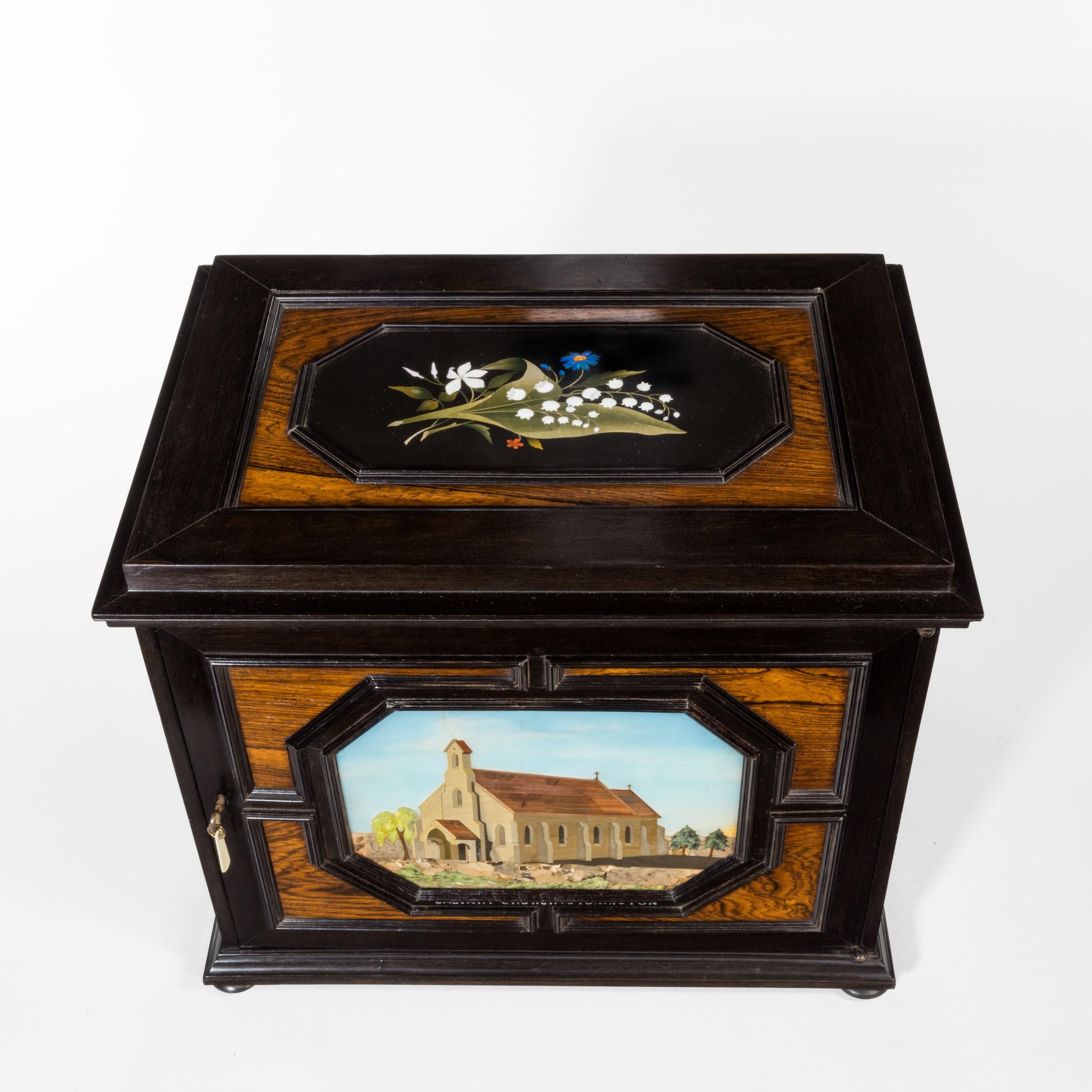 An unusual ebony bijouterie table cabinet showing Calvary Church, Stonington, Lo In Good Condition For Sale In Lymington, Hampshire