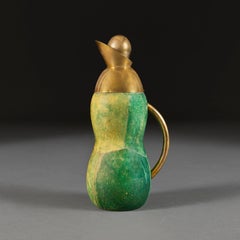 An unusual green vellum and brass flask