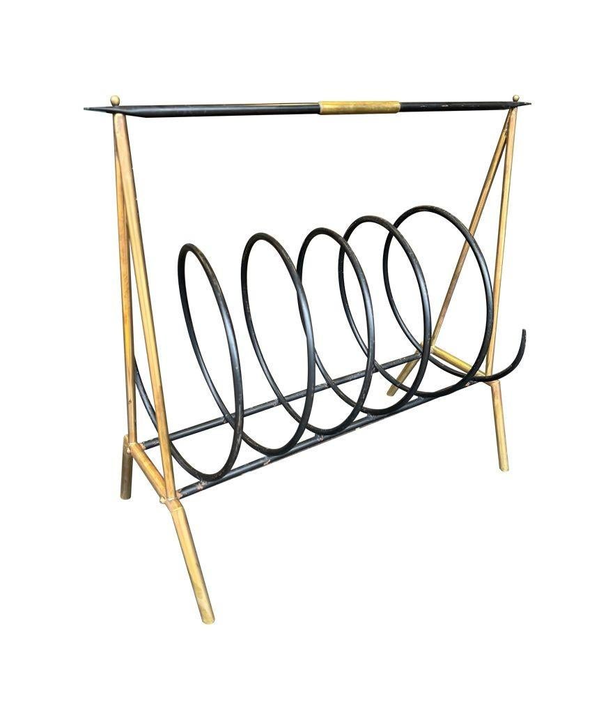 Un insolito portariviste a spirale italiano degli anni '50 in ottone e laccato nero in vendita 10