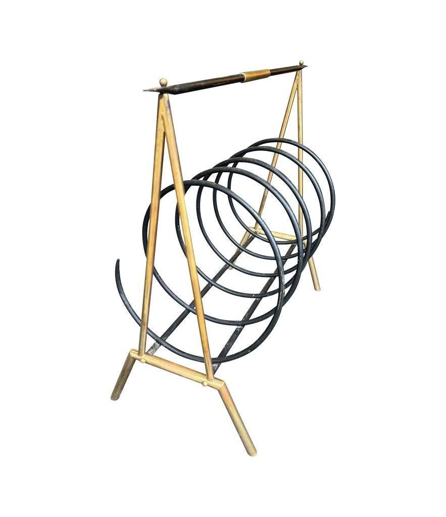 Un insolito portariviste a spirale italiano degli anni '50 in ottone e laccato nero in vendita 1