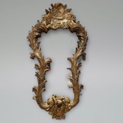 An Unusual Large Carved Giltwood Wall Mirror