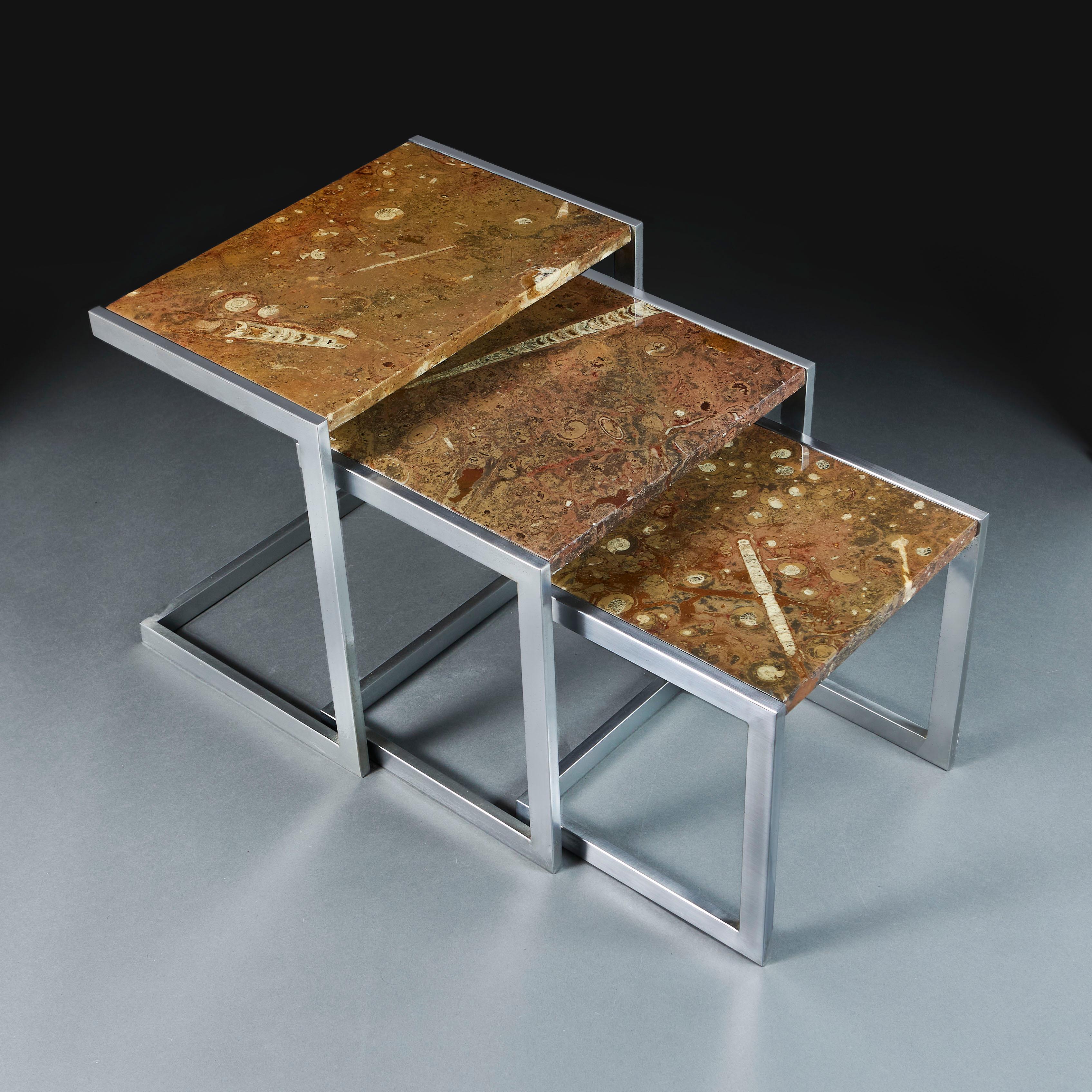 Italy, circa 1970

An unusual nest of three tables of graduated size, the tops decorated with brown marble fossil tops, supported by brushed steel bases of geometric form.

Height 46.00cm
Width 48.00cm
Depth 33.00cm