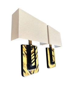 An unusual pair of 1970s Italian lacquered marquetry bone and brass sconces