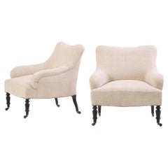 An Unusual pair of French Napoleon III lounge chairs, C. 1860.