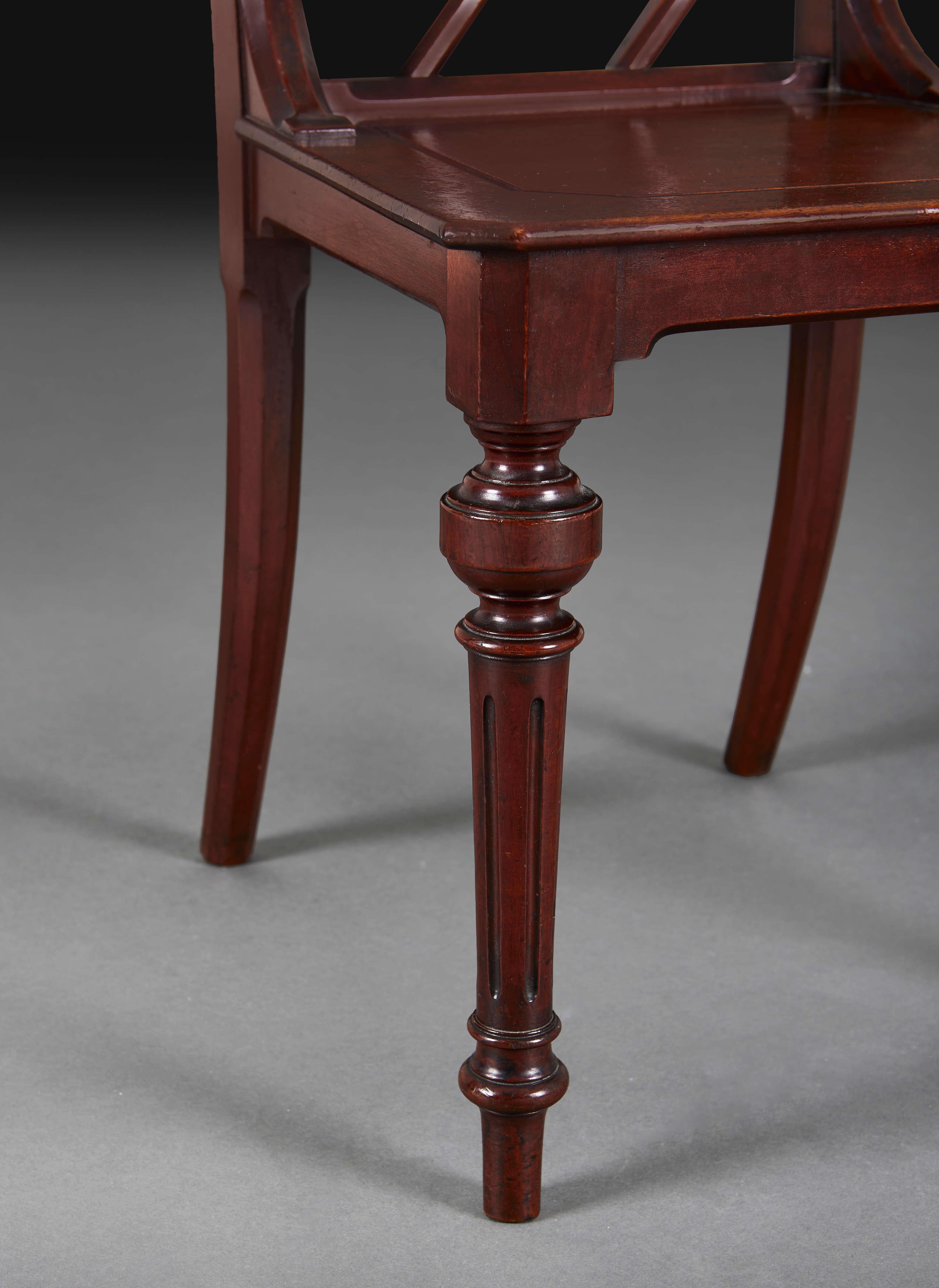 19th Century An Unusual Pair of Hall Chairs For Sale