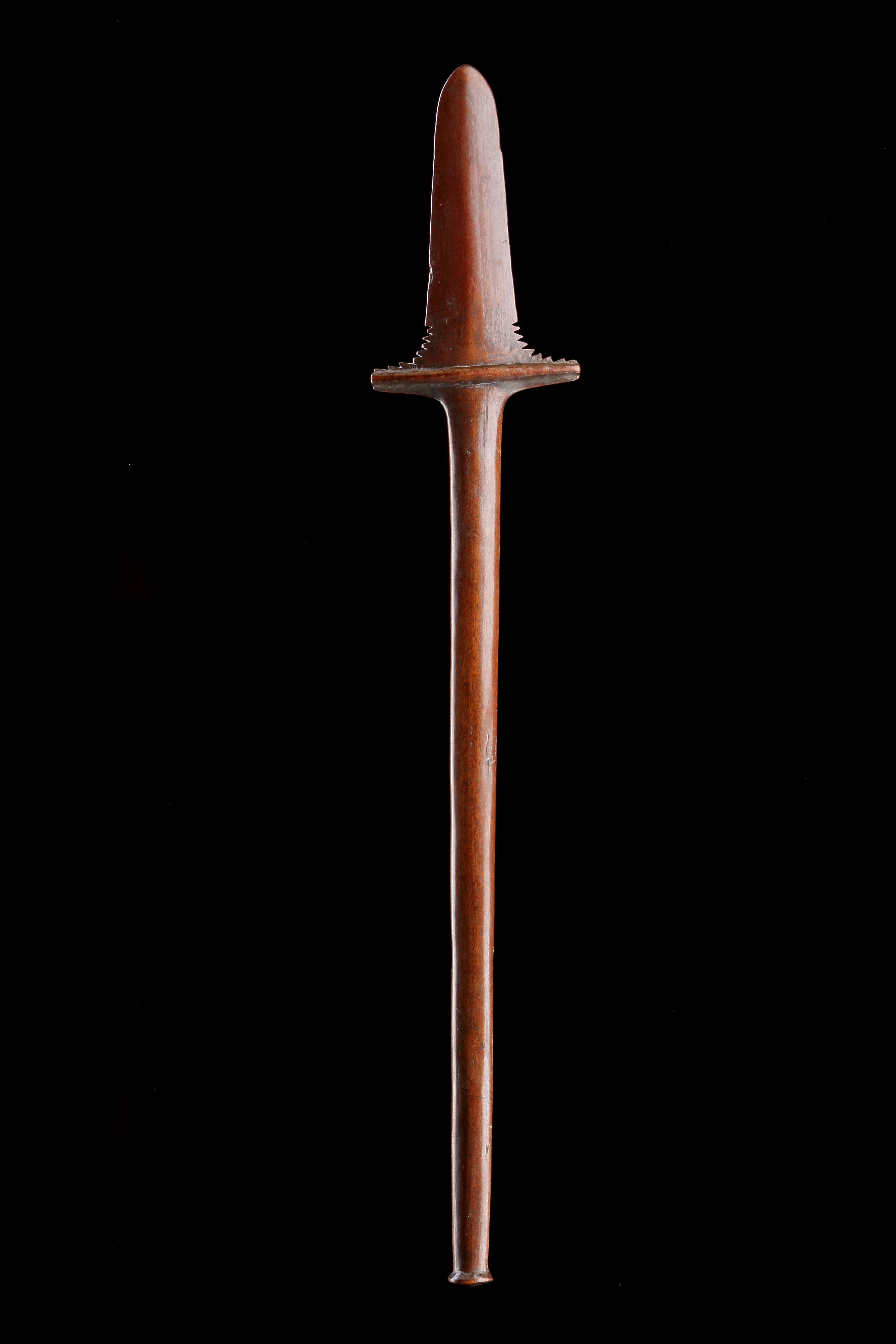 An Unusual Polynesian ‘Child’s’ Fighting Club 
Old patina and mellow colour 
Wood 
Fiji 
19th Century 

SIZE: 84.5cm long - 33¼ ins longù

Provenance:
Ex Welsh collection, sold at auction 2018 
Ex Private collection 