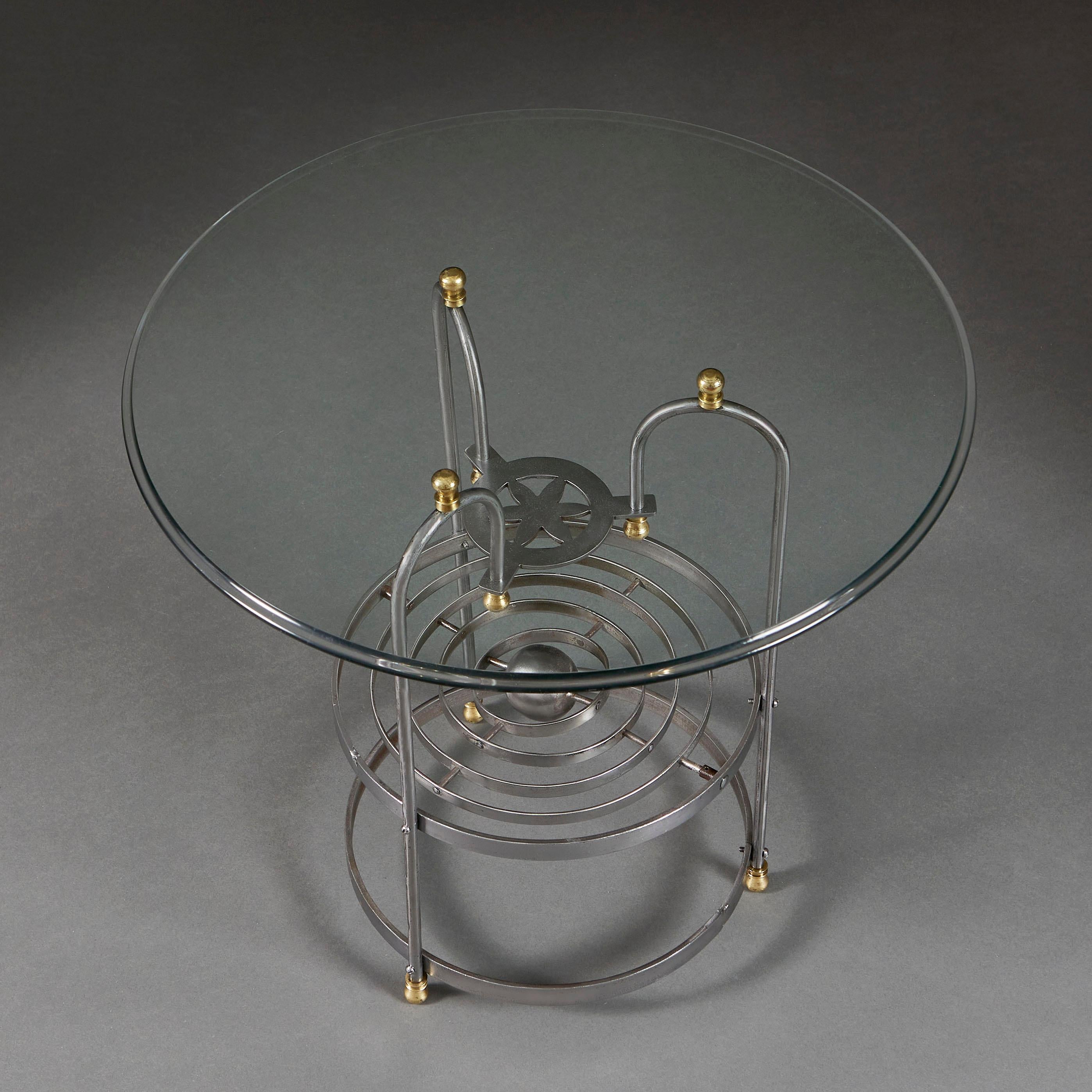 An unusual steel brass astronomical table with glass top In Good Condition For Sale In London, GB