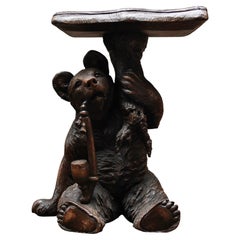An Unusual Swiss Carved Black Forest Smoking Table