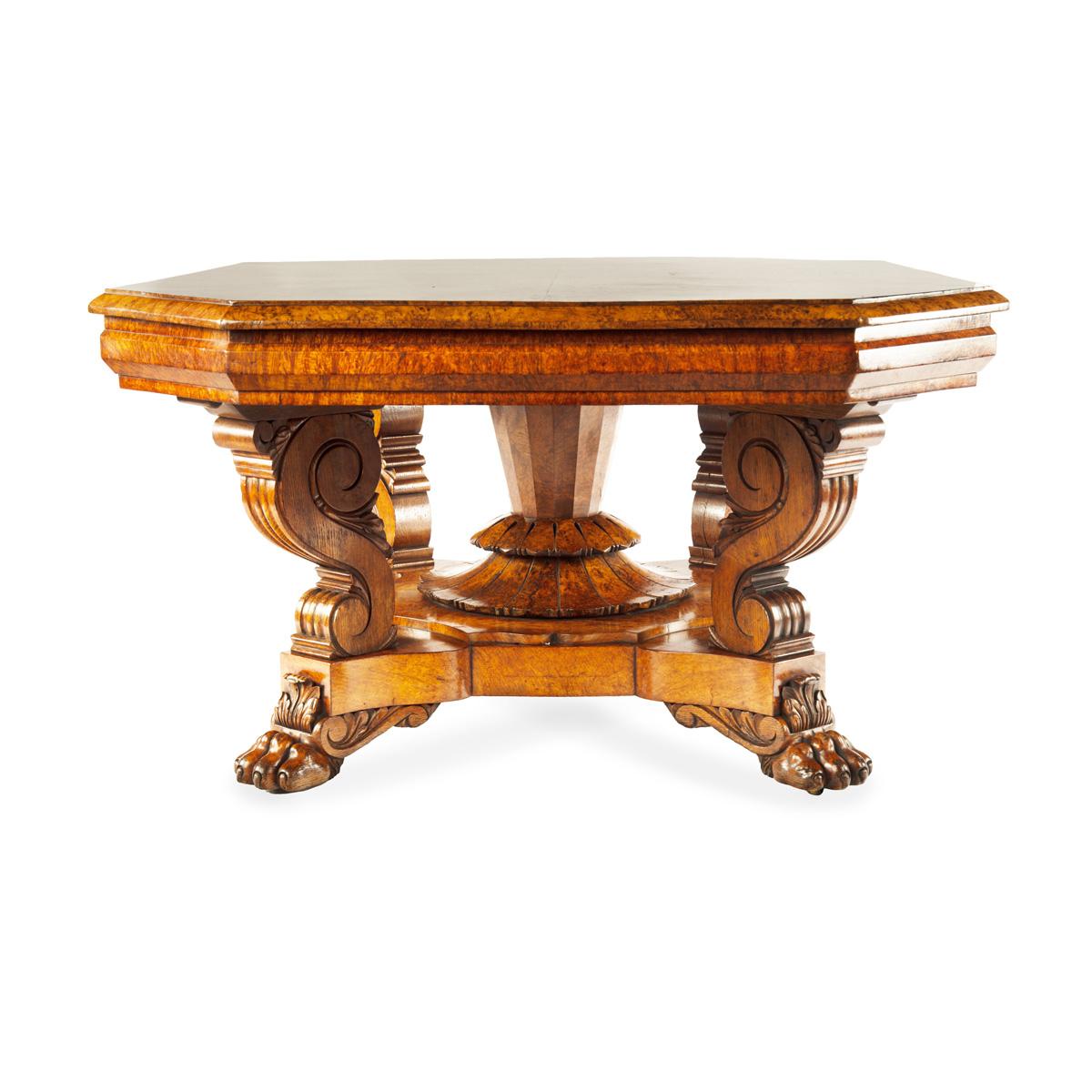 English An unusual William IV amboyna and oak four drawer library table by Simpson For Sale