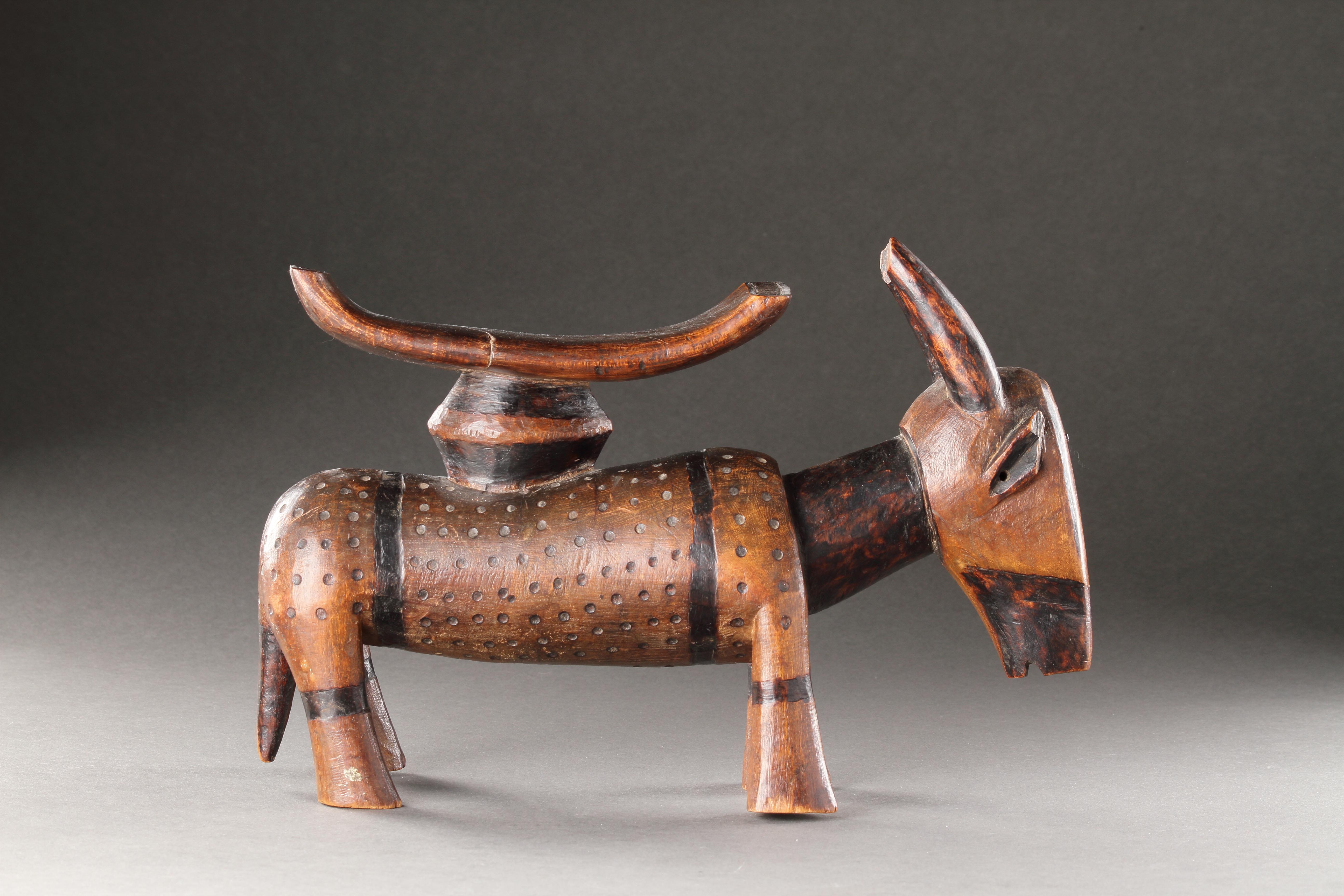 An Unusually Large and Fine Tsonga ‘Antelope’ Headrest 
Wood, pigment, glass beads 
Zimbabwe
19th Century 

SIZE: 20cm high, 32cm wide - 8 ins high, 12½ ins wide 

PROVENANCE:
Ex Private UK collection 
Sold through auction and purchased through