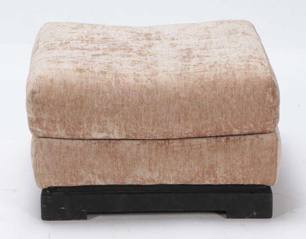 Mid-Century Modern An upholstered ottoman on ebonized base by Jacques Charpentier circa 1970. For Sale