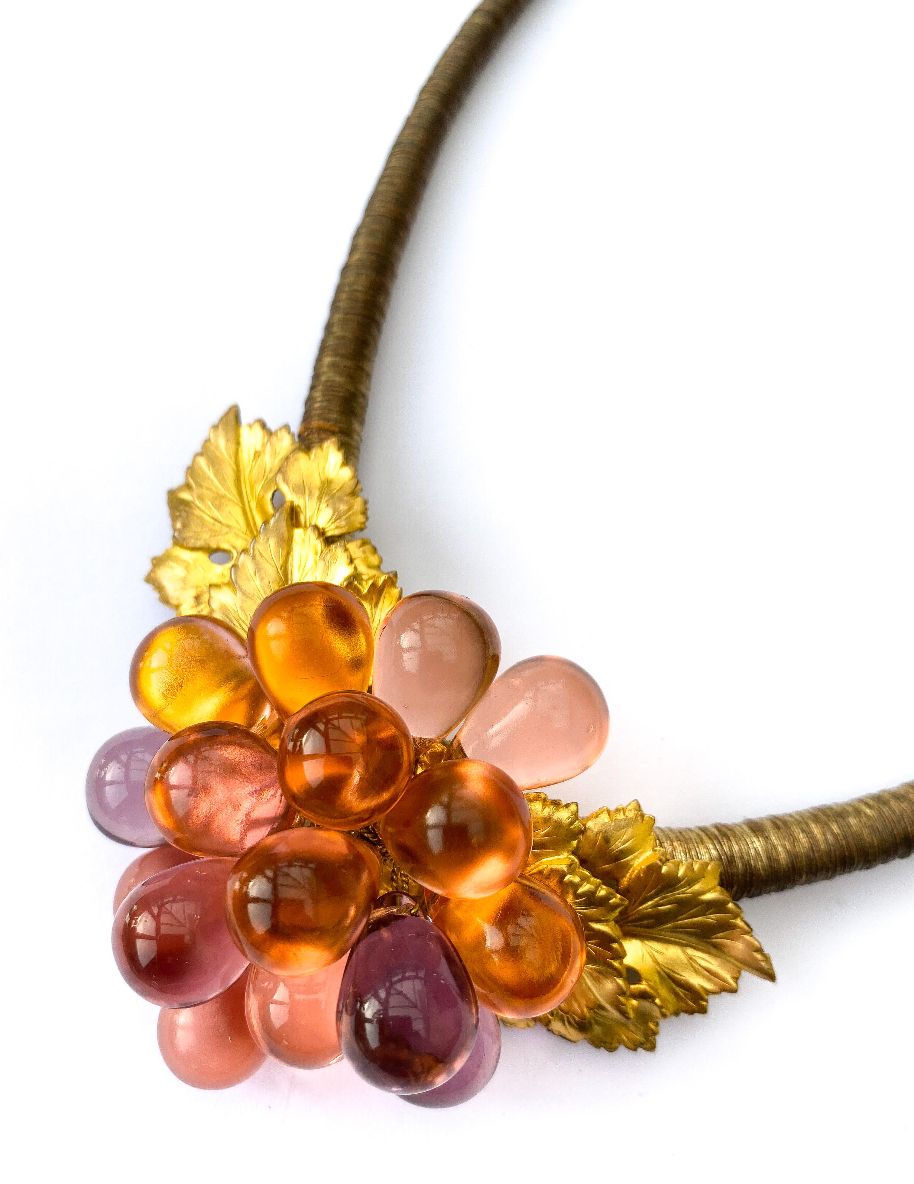 An very unusual coloured glass and gilt metal 'grape' necklace, France, 1920s. 1