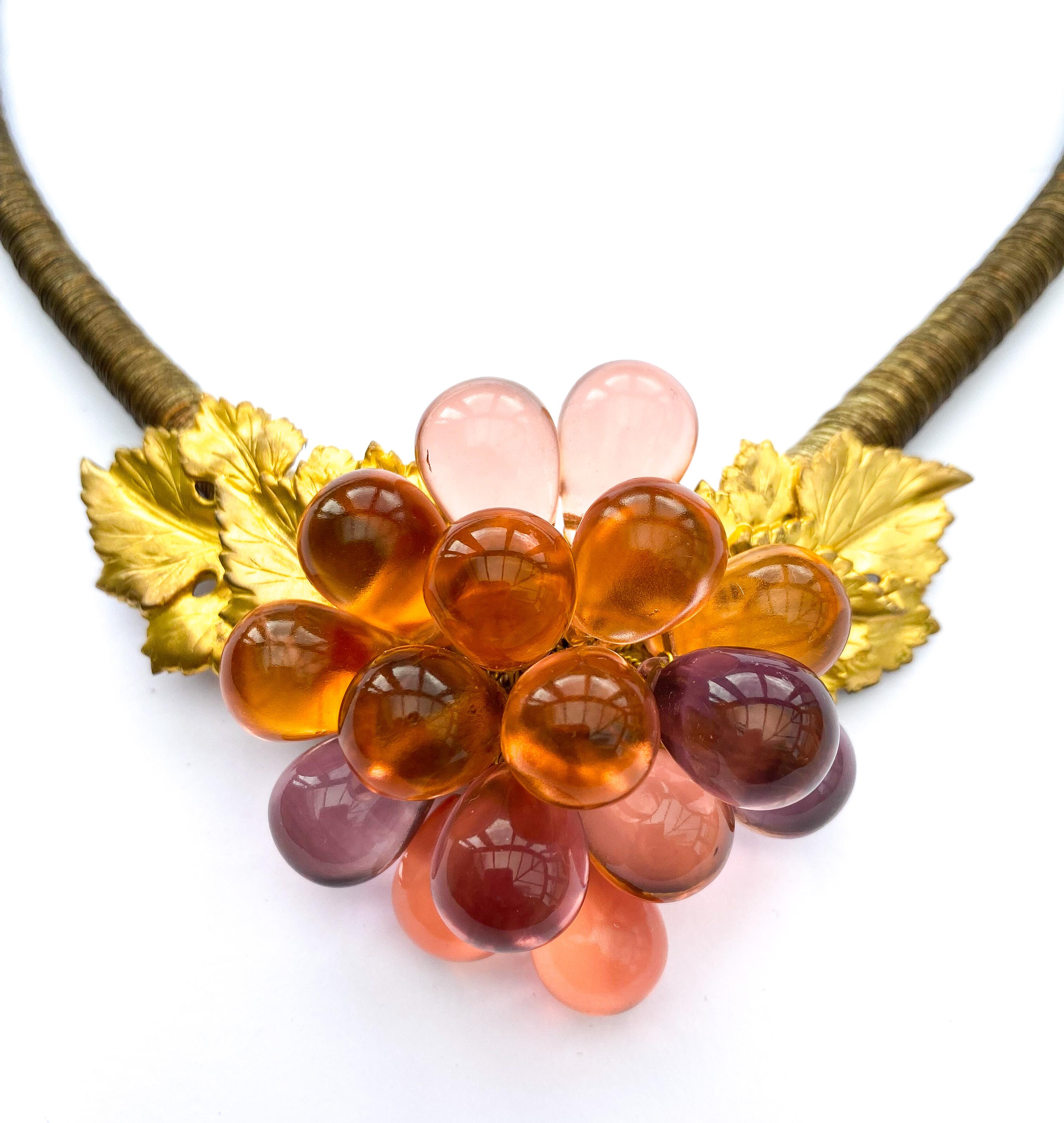 An very unusual coloured glass and gilt metal 'grape' necklace, France, 1920s. 2