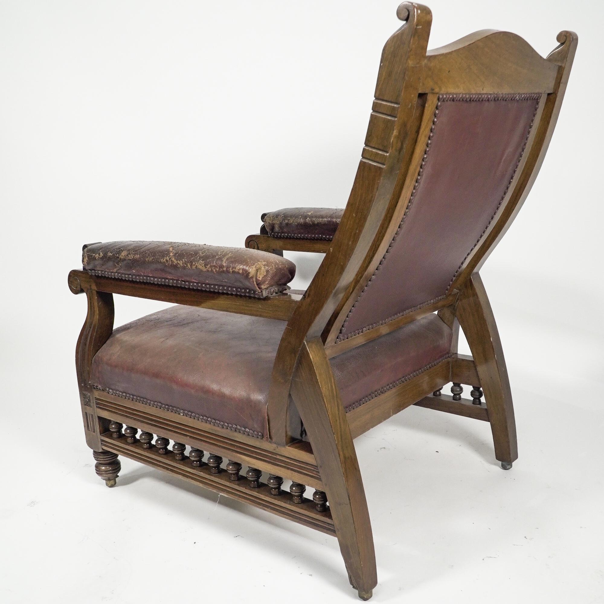 An Aesthetic Movement walnut armchair with a curvaceous back leather upholstery. For Sale 4