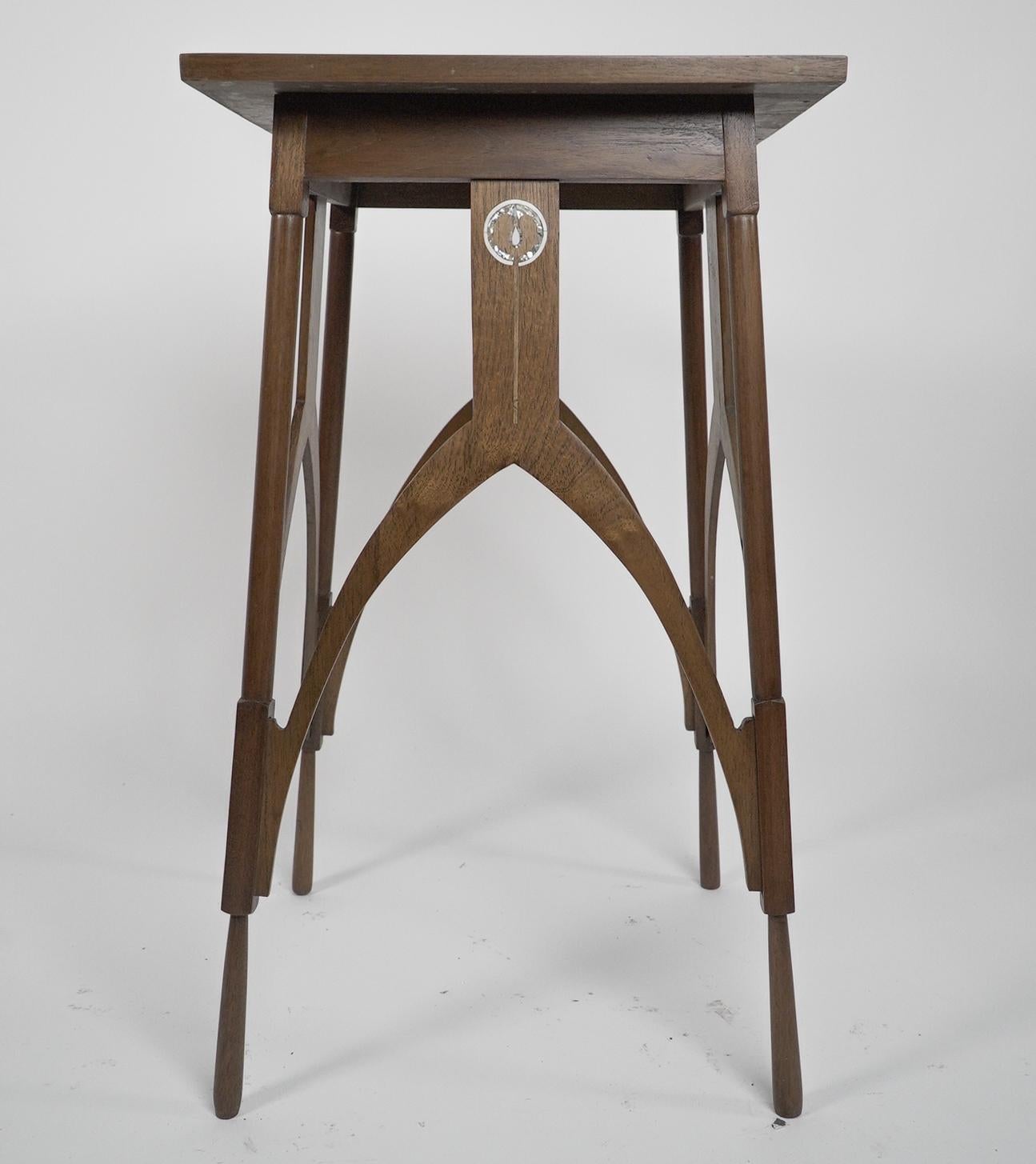 English Baillie Scott style, A Walnut side table inlaid with Mother-of-Pearl decoration. For Sale