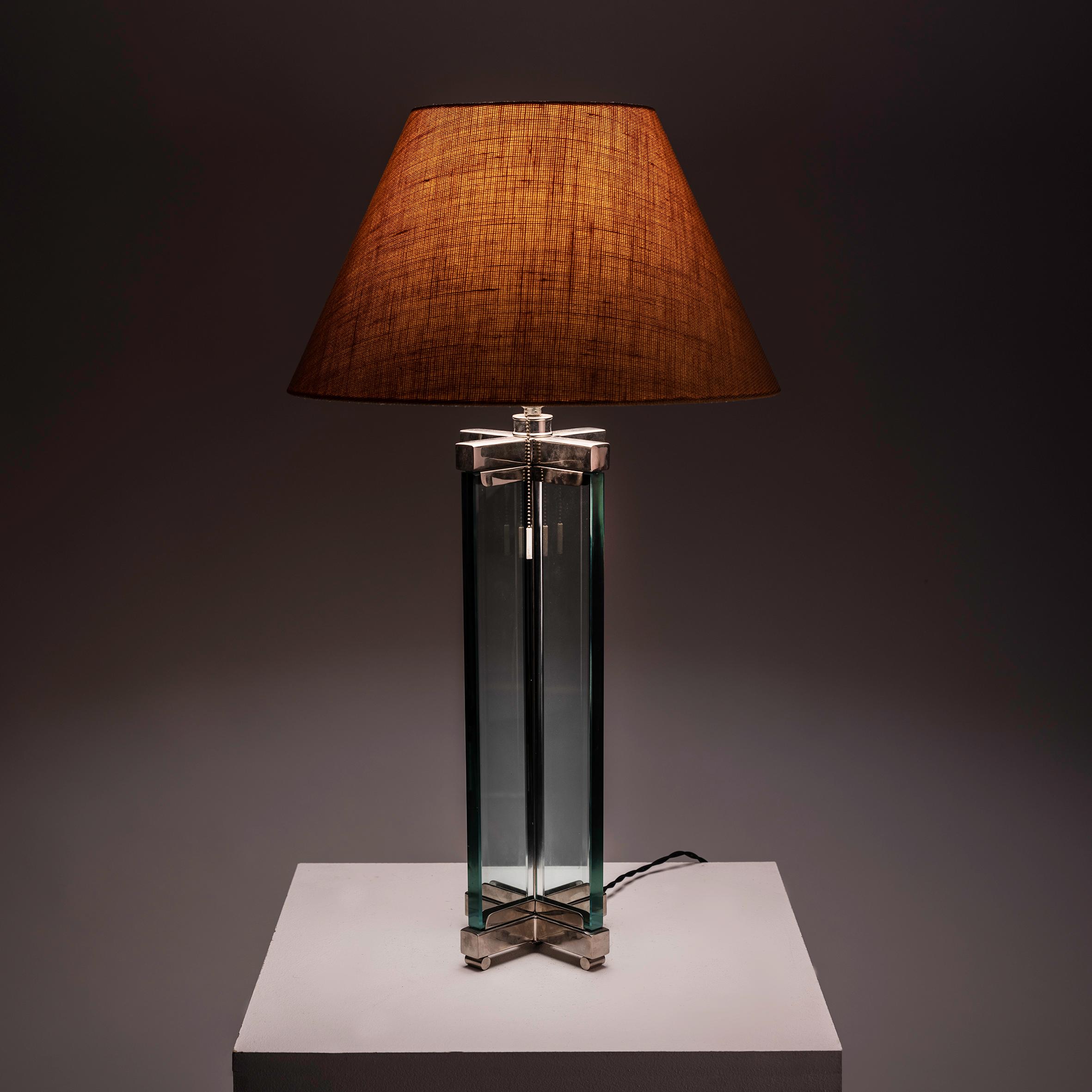 
Indulge in the timeless allure of Italian design with the XXL glass table lamp, echoing the distinguished style of Fontana Arte. Crafted with finesse and elegance, this lamp encapsulates the essence of sophistication and refinement, making it a