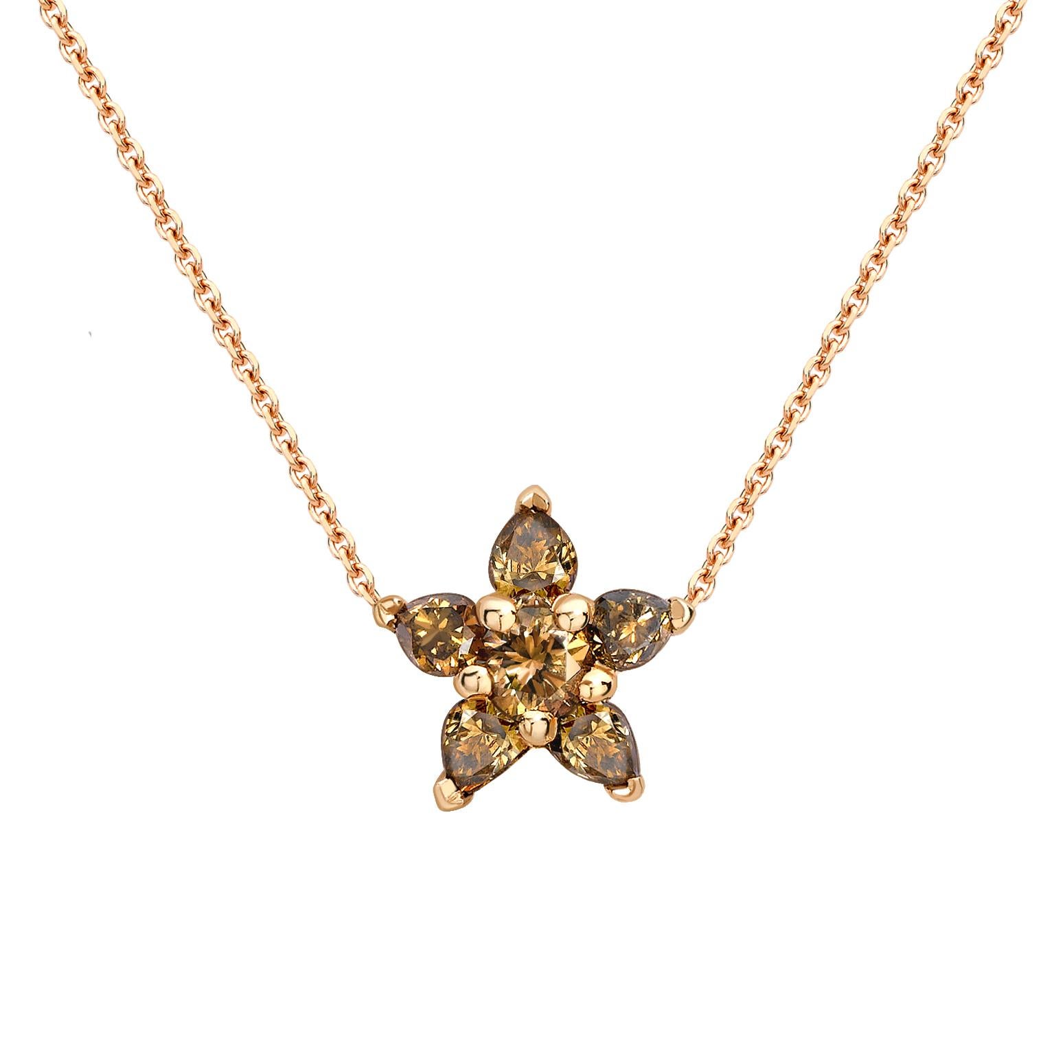 This beautiful set works well worn together or individually and offers versatility. 

This delicate pendant is handcrafted from 18ct rose gold and set with natural cognac diamonds which total 0.45ct. It an elegant piece dressed up or down and is the