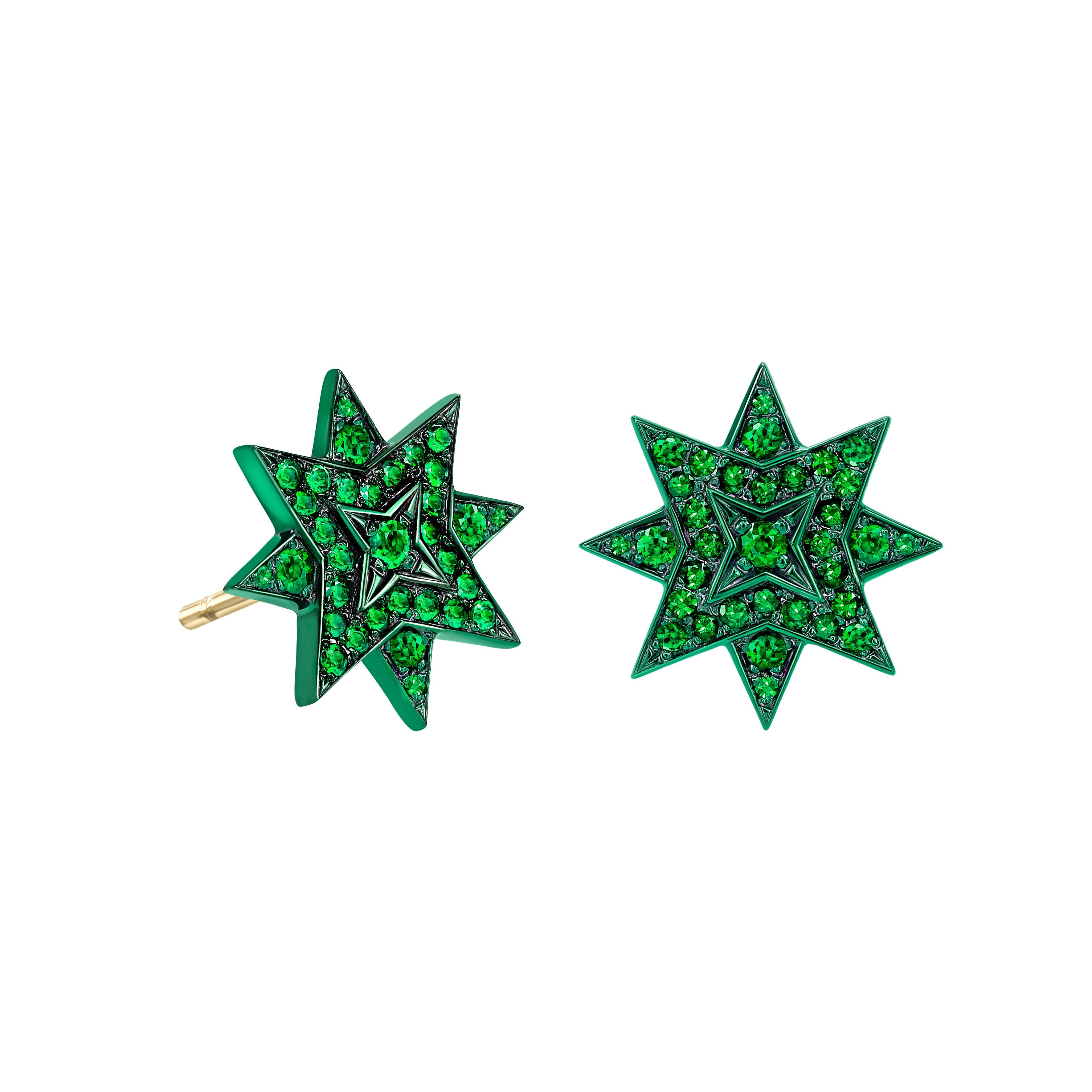 These beautiful star stud earrings have been handcrafted in London from 18ct yellow gold and are set with 0.80ct of emeralds. The top and sides of the stars have been finished with a green gold lacquer to enhance the electric green colour of the