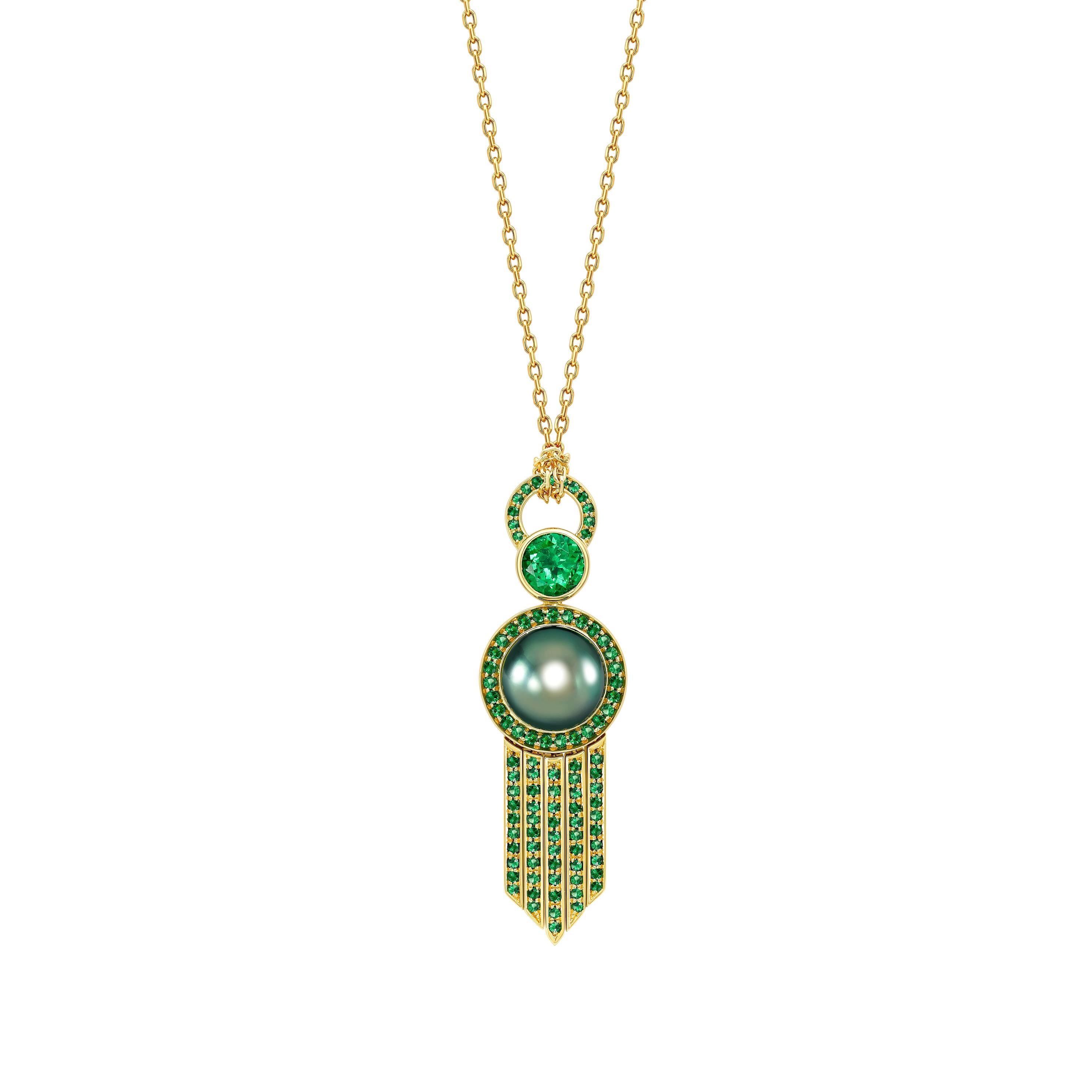 This beautiful set would be perfect to be worn together or as separate pieces and features the following pieces:

Pendant: 

The pendant has been handcrafted in 18ct yellow gold and is a unique one of a kind piece. The large natural tsavorite weighs