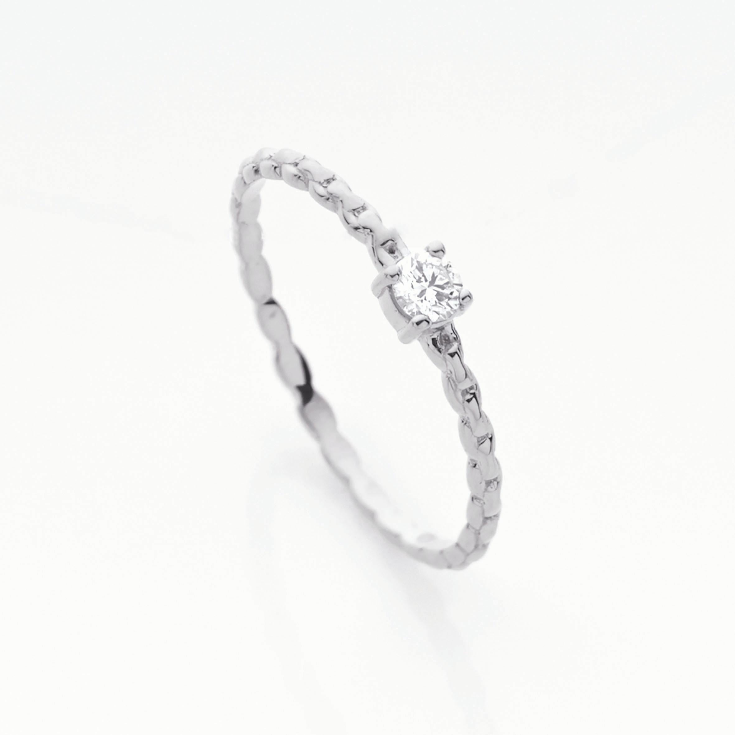 PETITE DIAMOND COLLECTION 

Inspired by the Twinkling Stars of The Night, the Petite Diamond Collection is a series of almost invisible skin-jewellery;  hand-crafted with the most delicate diamond-setting and workmanship possible.   Much like the