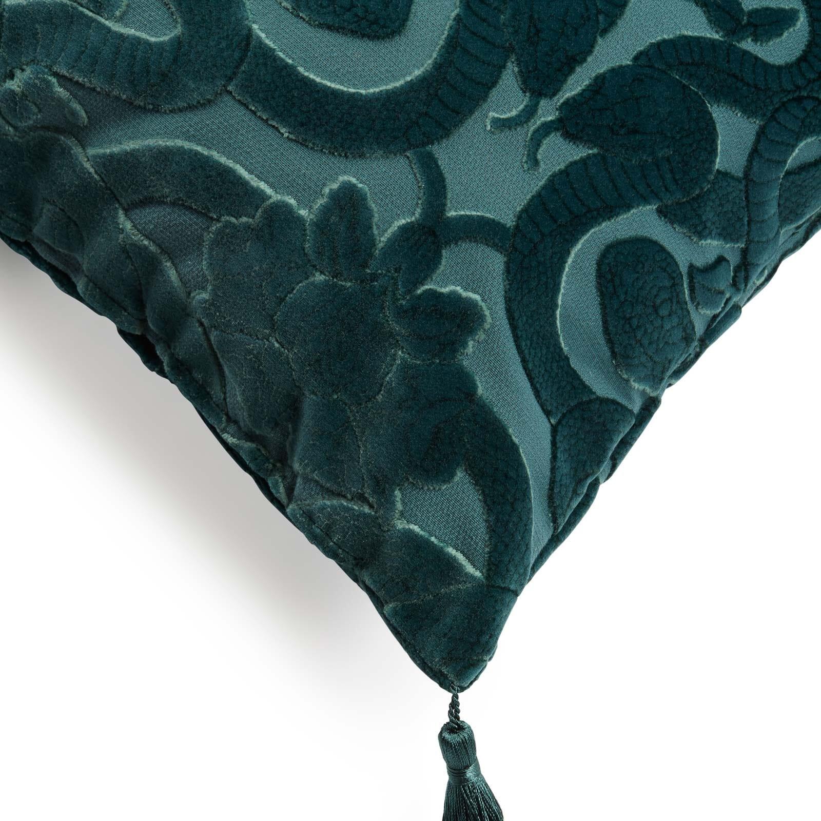 Evocative of the Garden of Eden, the ANACONDA cushion writhes with snakes, our House symbol of rebirth and renewal, intertwined amongst exotic flowers. Made in England with Italian tassels on each corner, this piece is crafted from cut-velvet, an