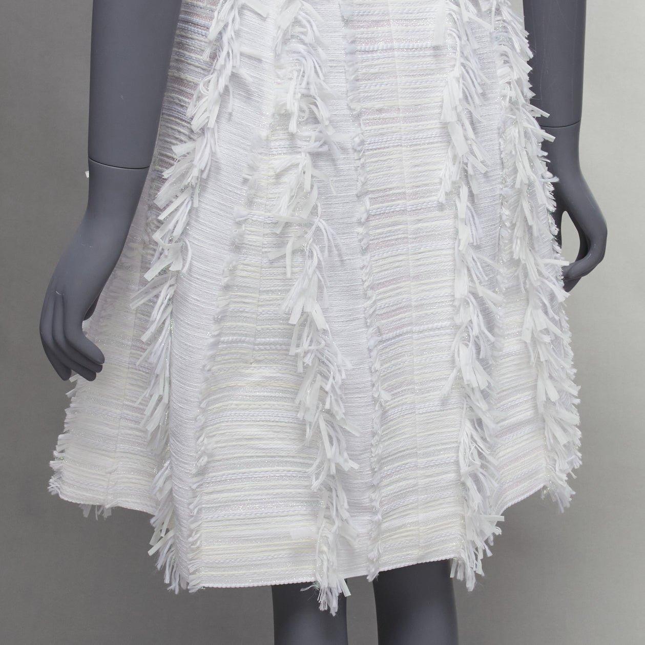 ANAIS JOURDEN white metallic lurex tweed A-line midi dress FR36 S
Reference: BSHW/A00013
Brand: Anais Jourden
Material: Polyester, Cotton
Color: White, Multicolour
Pattern: Solid
Closure: Zip
Lining: White Fabric
Extra Details: Back zip.
Made in: