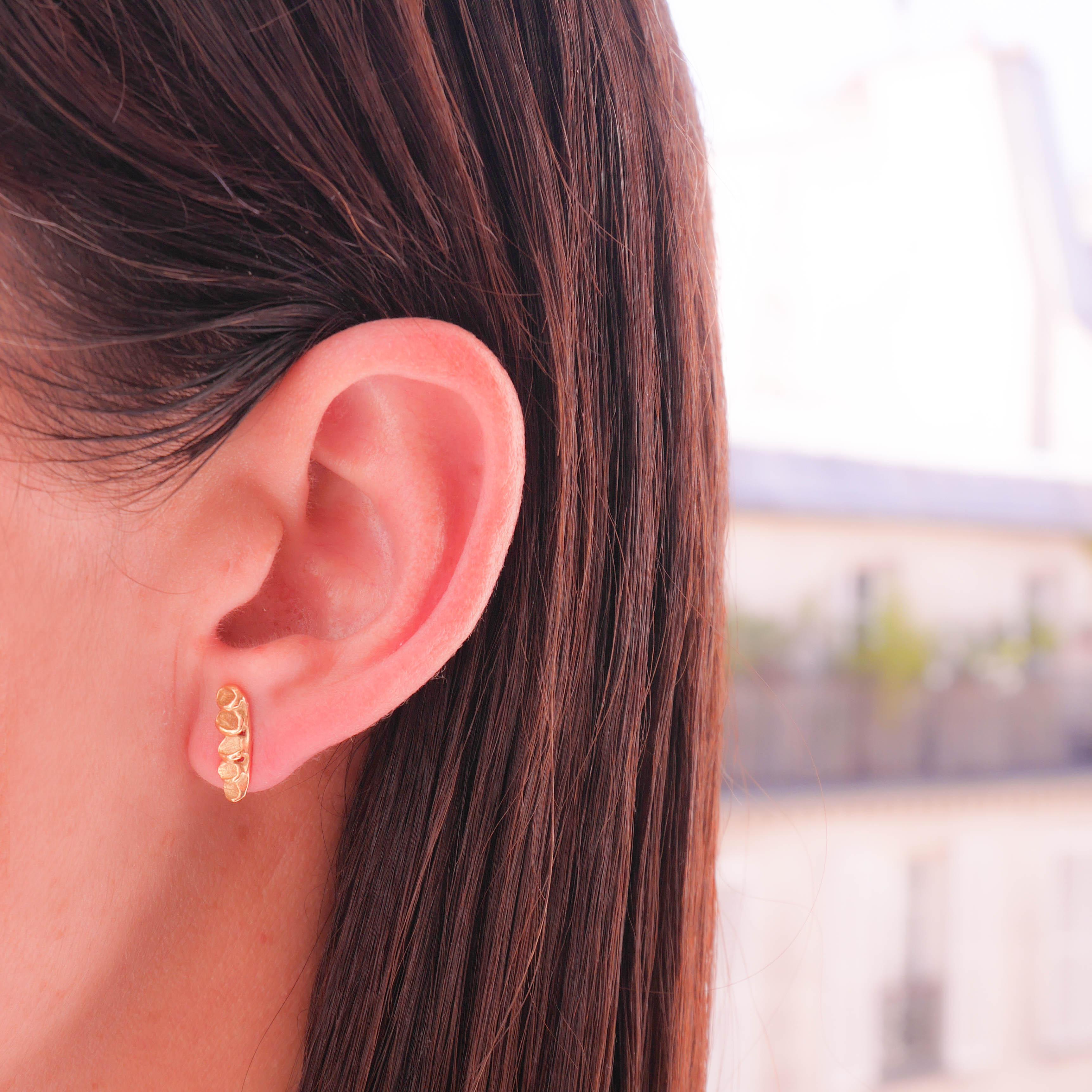 One of a kind earrings handcrafted from 18 Karat yellow gold weighs app. 3grm. Each leaf has been carefully hand-engraved by using time-honored techniques. 
Bell-back Alpa fastening for pierced ears.
The craftsmanship is entirely hand made with
