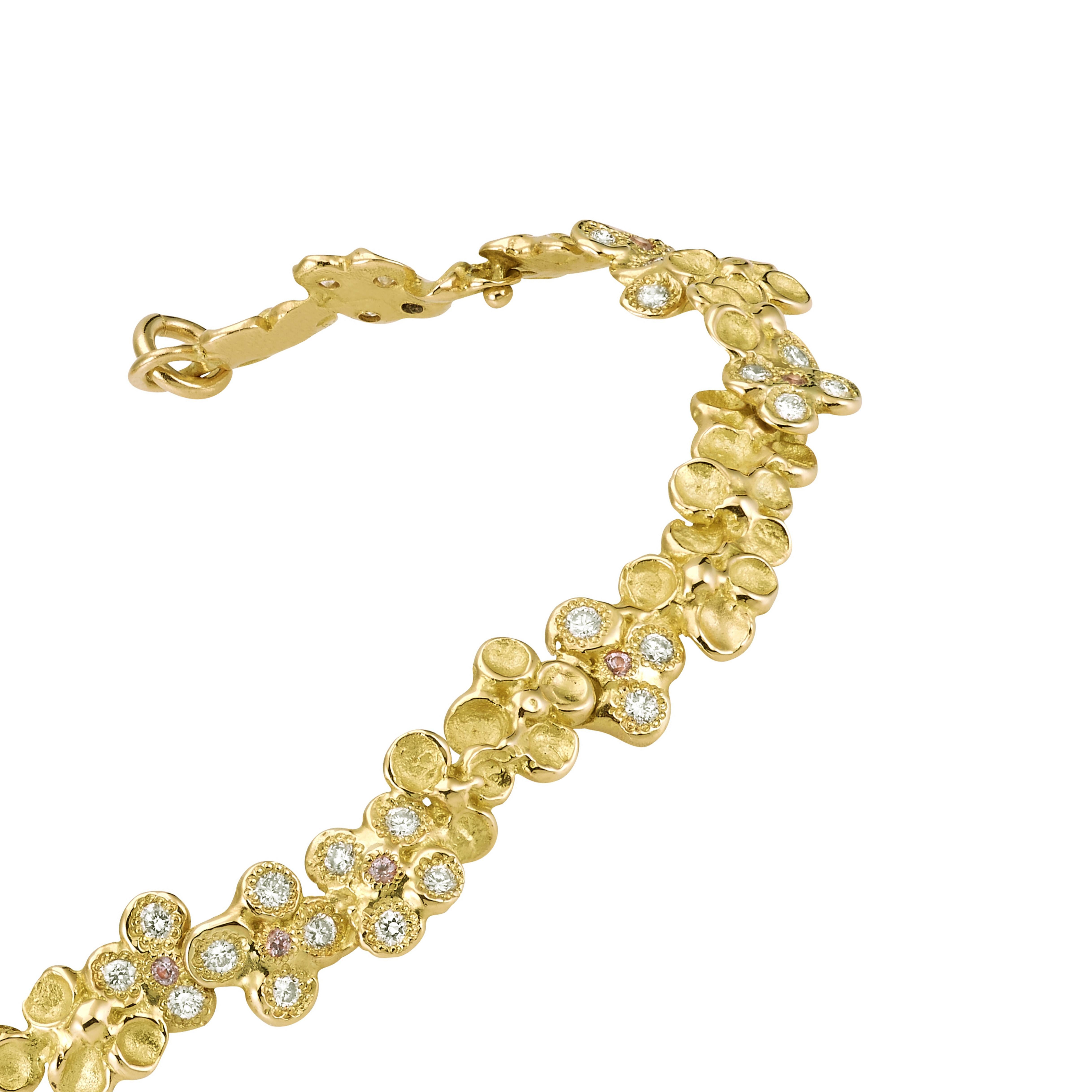 Contemporary 18 Karat Yellow Gold Diamond Pink Sapphires Flower Bracelet For Sale
