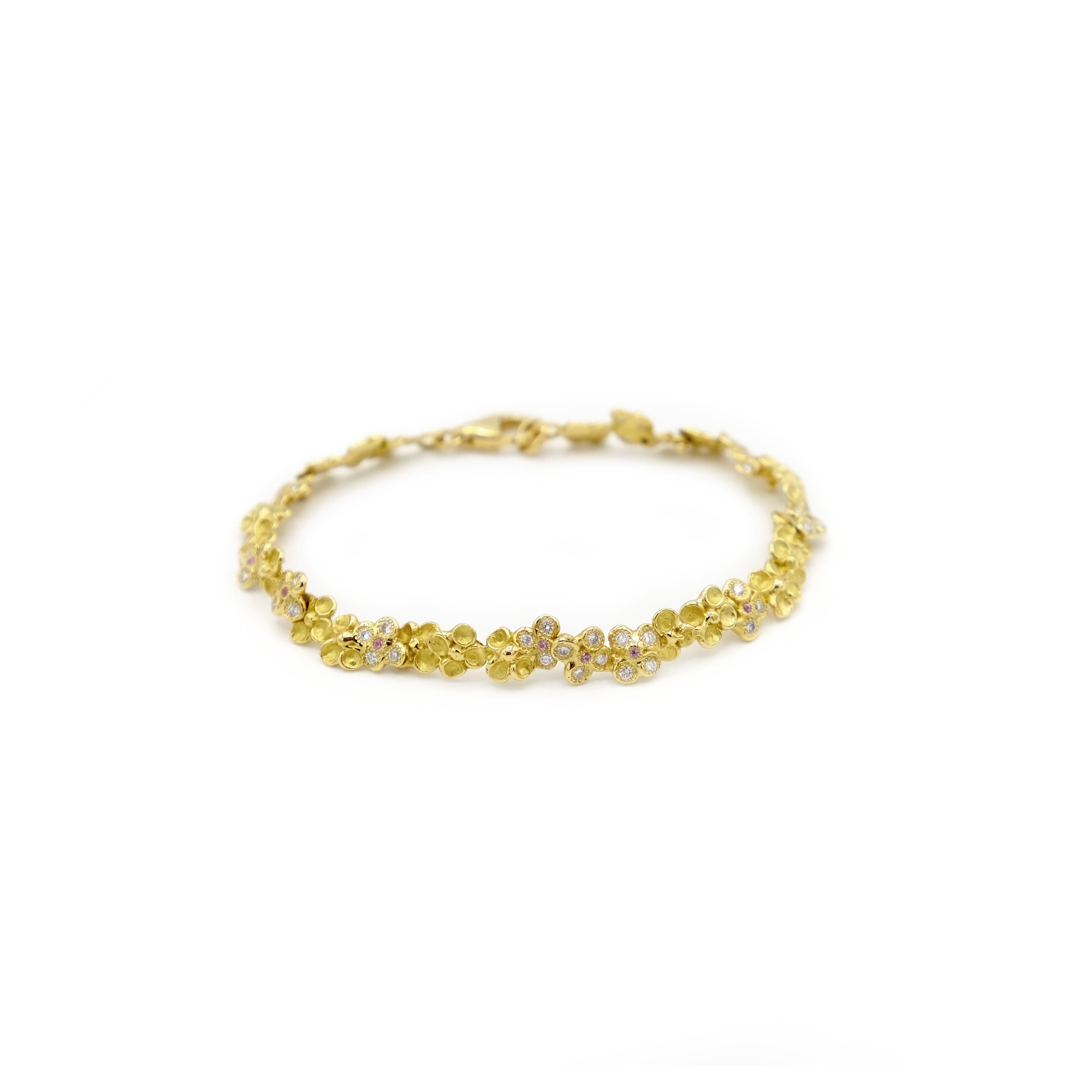 Round Cut 18 Karat Yellow Gold Diamond Pink Sapphires Flower Bracelet For Sale