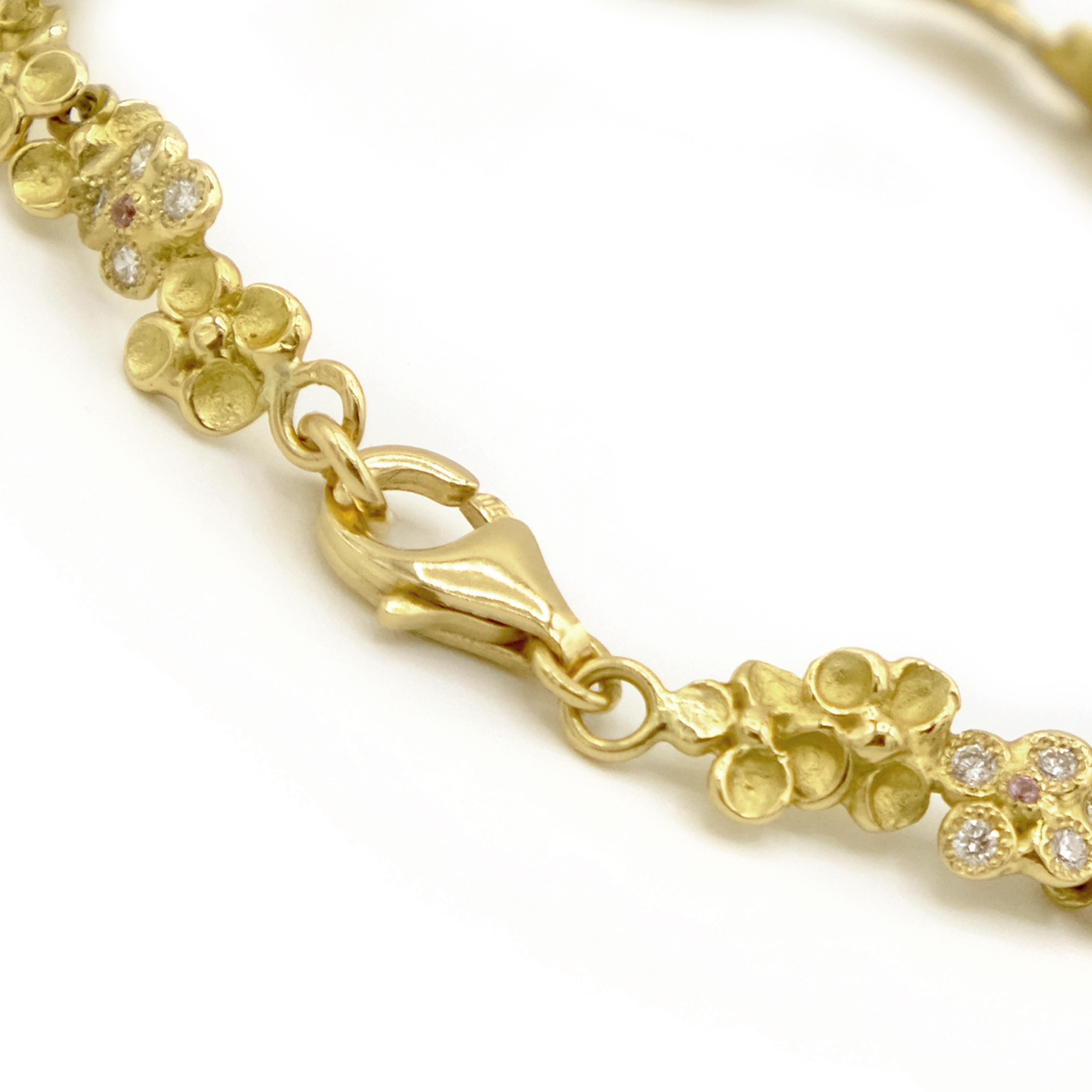 Women's 18 Karat Yellow Gold Diamond Pink Sapphires Flower Bracelet For Sale
