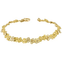 18 Karat Yellow Gold Diamond Pink Sapphires Flower Bracelet