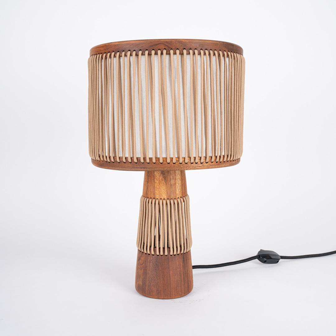 Anaka Table Lamp by Saadia Design
Dimensions: D 28 x W 28 x H 46 cm.
Materials: Wood, linen, and rope.

All our lamps can be wired according to each country. If sold to the USA it will be wired for the USA for instance. Please contact us.