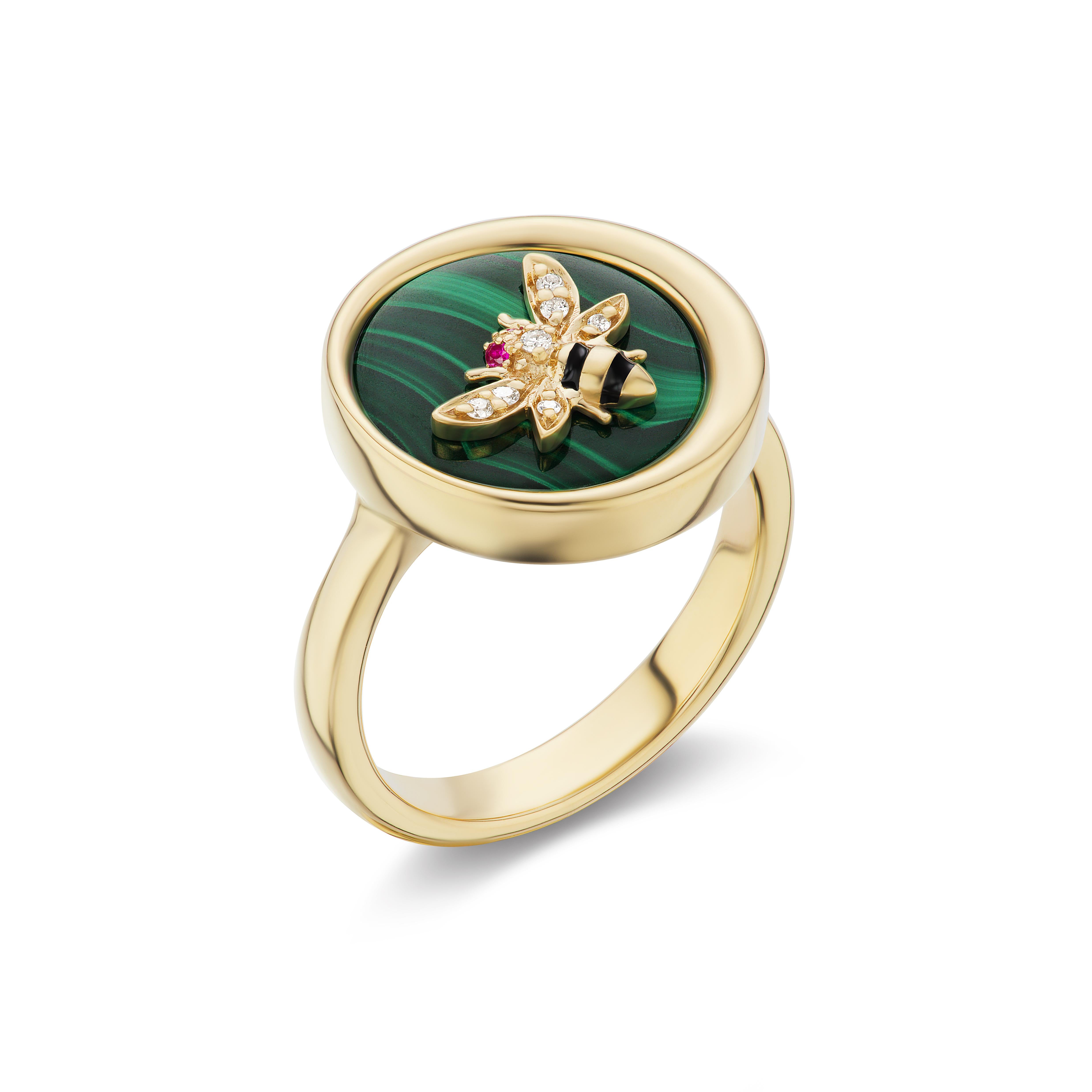 18k Yellow Gold, Malachite, .009ct Ruby, ..032ct Diamonds, and Black Enamel

Design Inspiration

The Four Element Earth Mini Ring expresses the abundance of our mother earth and reverence for the bumblebee without whom human life wouldn’t exist. In