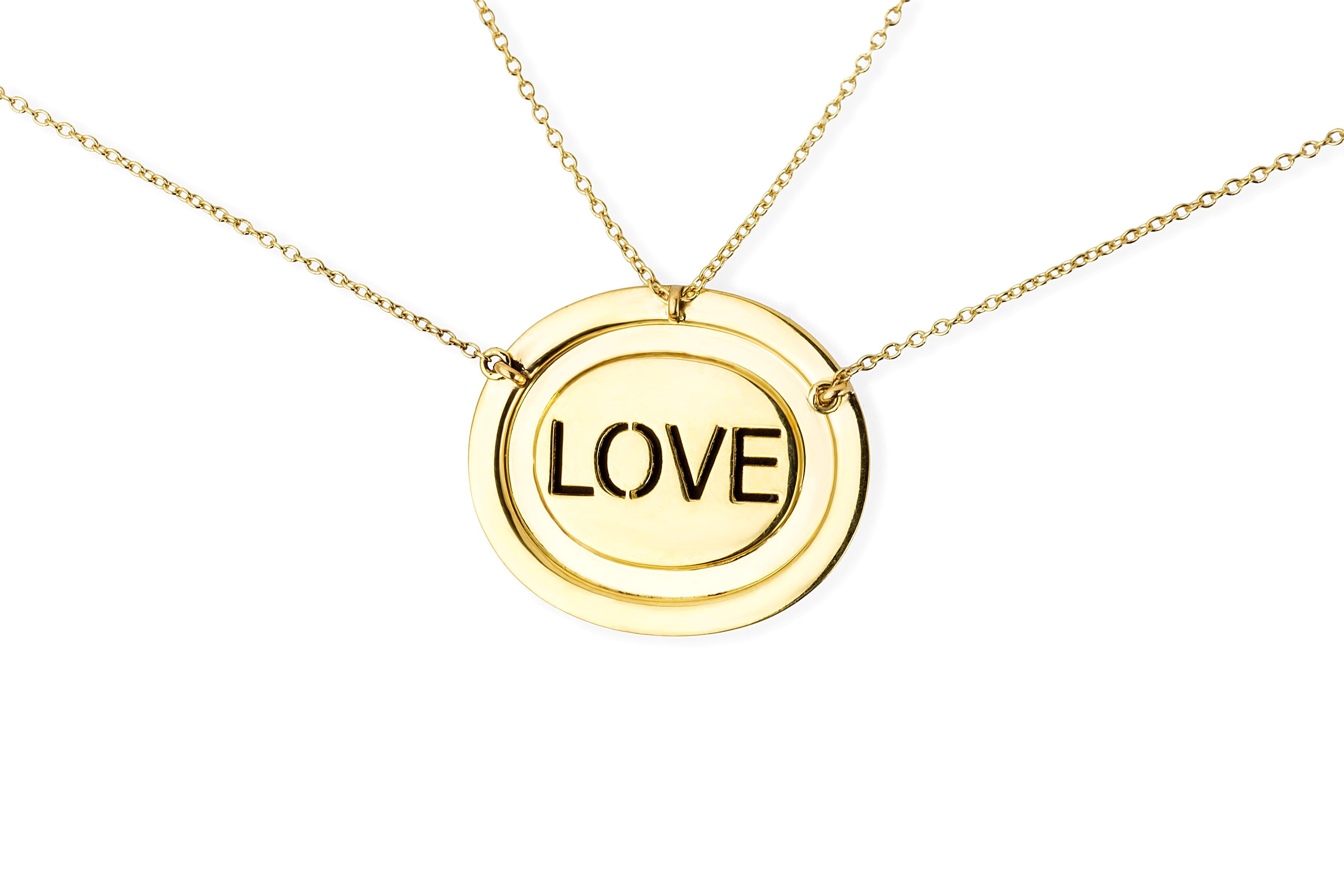 The blue agate cameo is hand created by a master carver bringing out the colors and depth within the layers of the stone. The cameo is encased in yellow gold, inverted diamonds, and sapphires. On each Eye Love Mini Cameo necklace, ‘love’ is found on