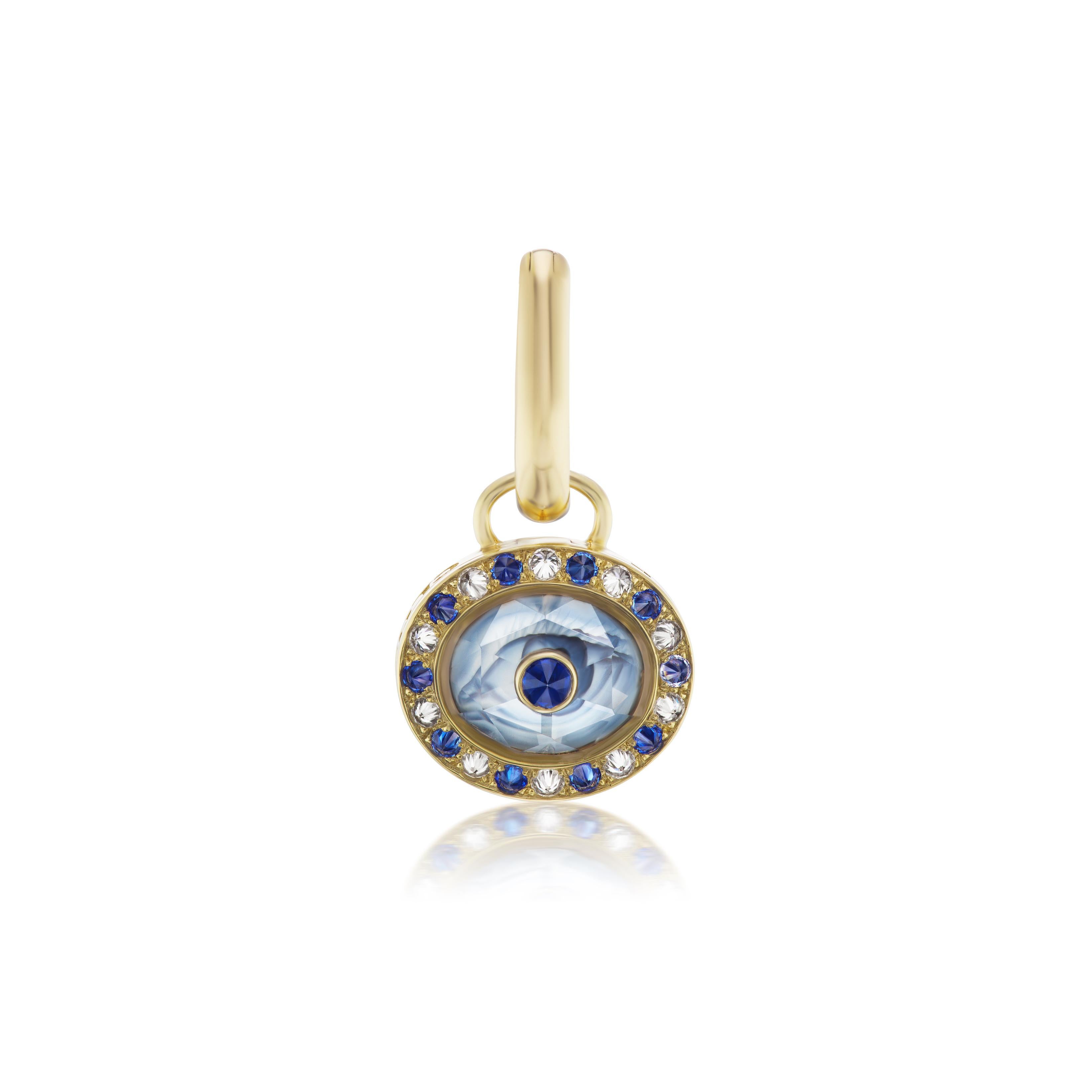 Ana-Katarina’s Love Locket Pendant is inspired by antique poison rings and her love of secrets. When closed, the Love Locket is a beautiful work of art. A hand-carved quartz crystal creates a faceted dome and is finished with an inverted sapphire