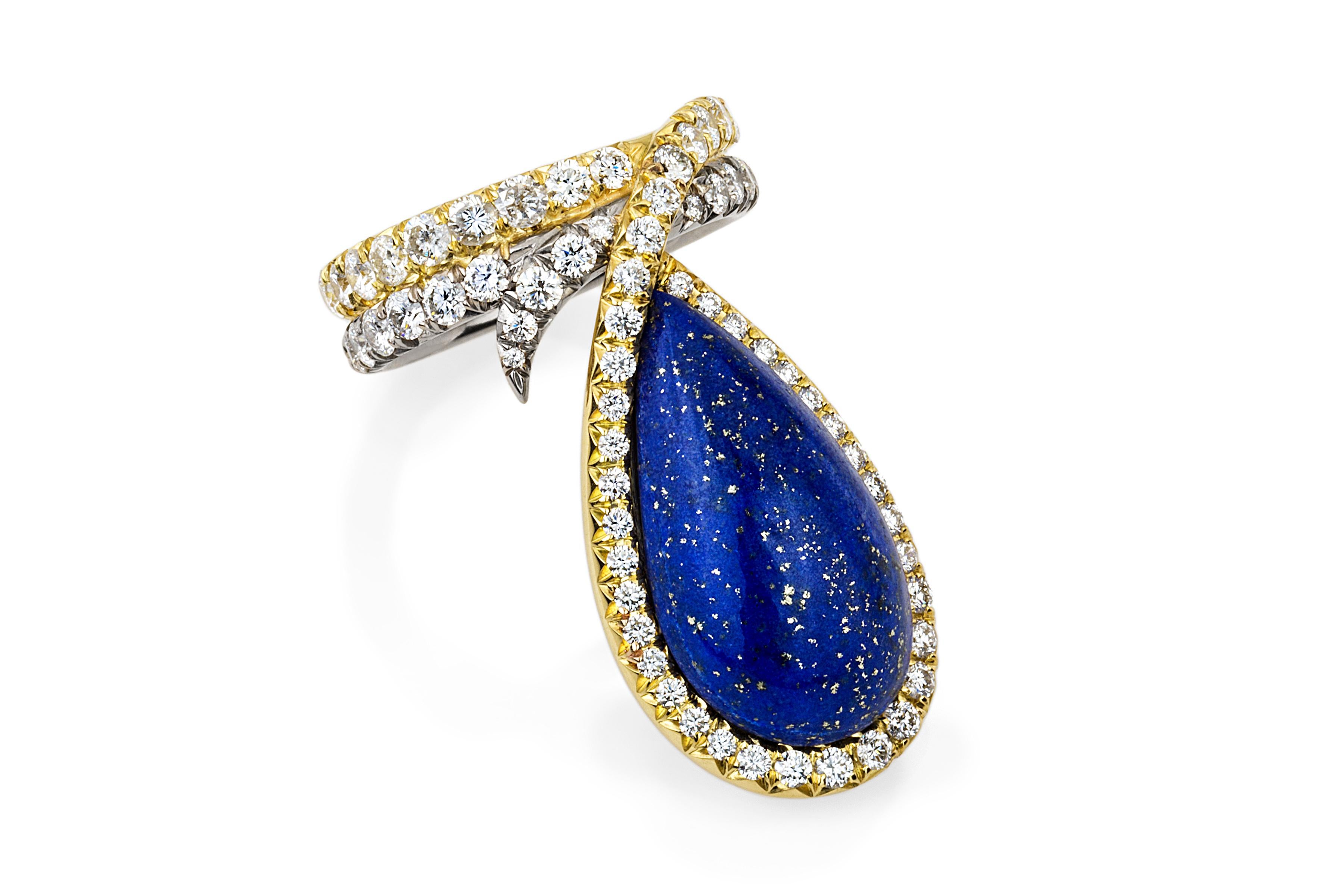 A one-of-a-kind piece inspired by the simple elegance of the blue and gold flakes embedded in the vintage Lapis Lazuli gem. A ribbon of sparkly diamonds set in 18k white and yellow gold gently follows the curve of the Lapis and the wearer's finger