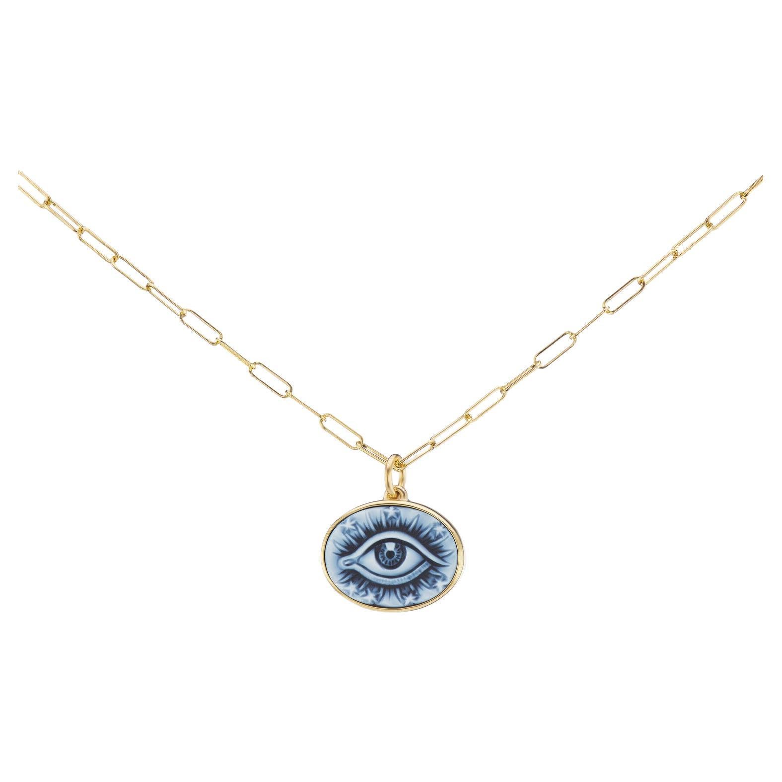 Hand-Carved Blue Agate Cameo and 18k Yellow Gold.

Design Inspiration 

Socrates's seven types of love inspired Ana-Katarina to create the Love Token Collection. Philautia is self-love. The third eye, with rays of intuition and stars, gazes outward.