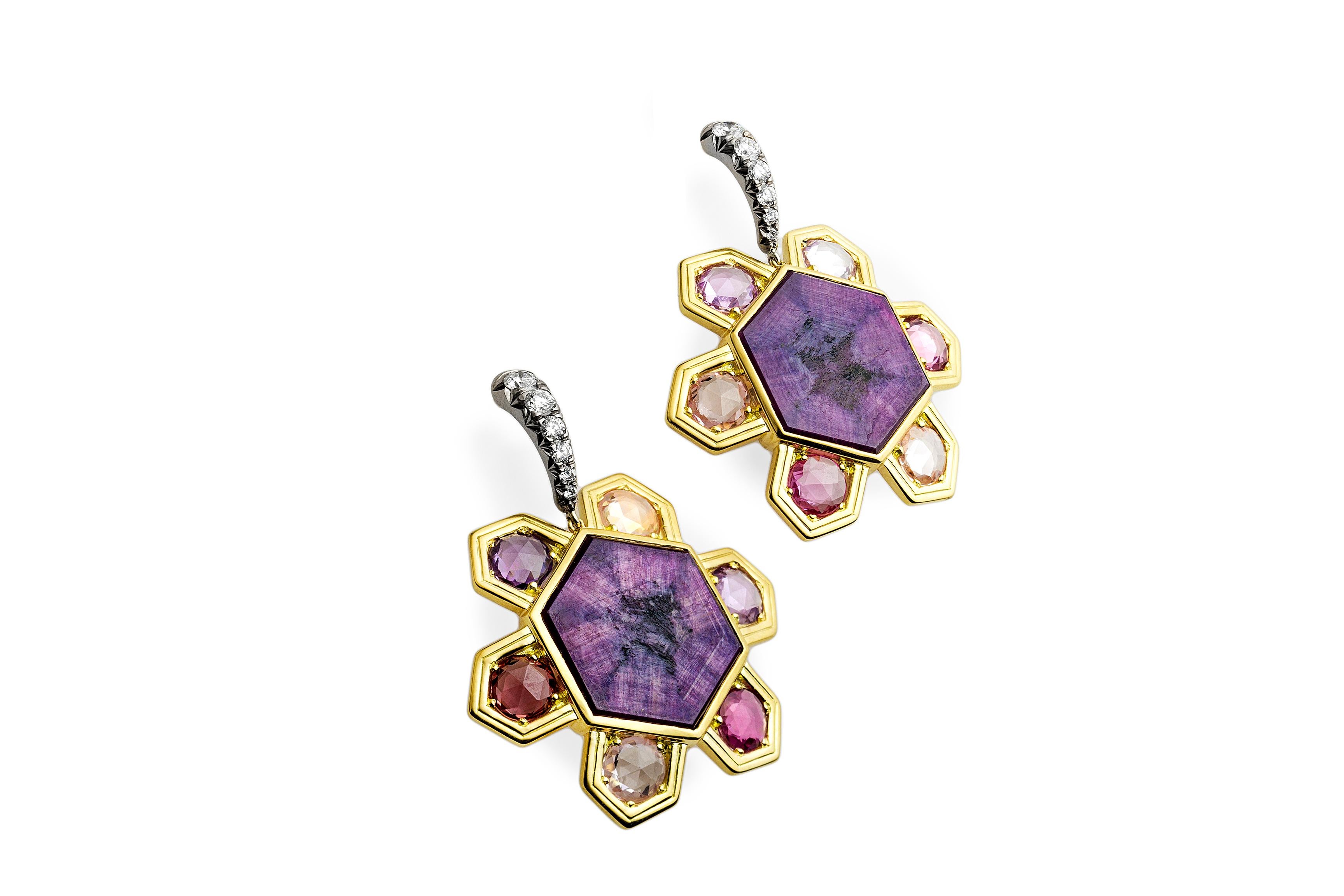 ONE-OF-A-KIND 

The 'Ne Me Quitte Pas' earrings are one-of-a-kind and are inspired by the rare and exquisite pair of Trapaiche rubies and unheated rose-cut multi-colored sapphires used in their creation. The ruby hexagon is surrounded by six