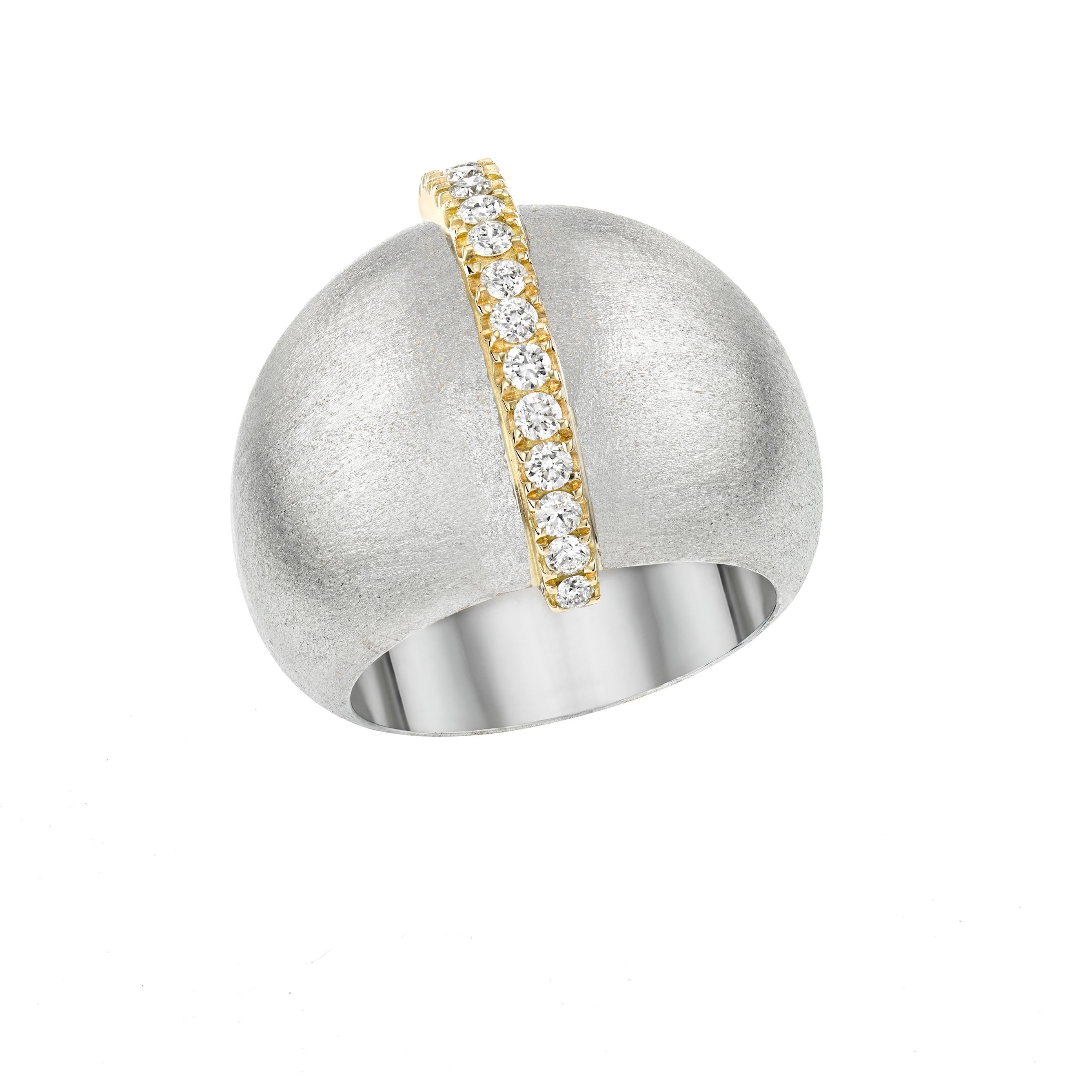 The organic shape of the AK’S TALISMAN Ring is true to AnaKatarina’s signature of addressing a classic form with a modern twist. A statement piece in white gold with a stone etched finish to resemble raw silk. A yellow gold and white diamond ridge